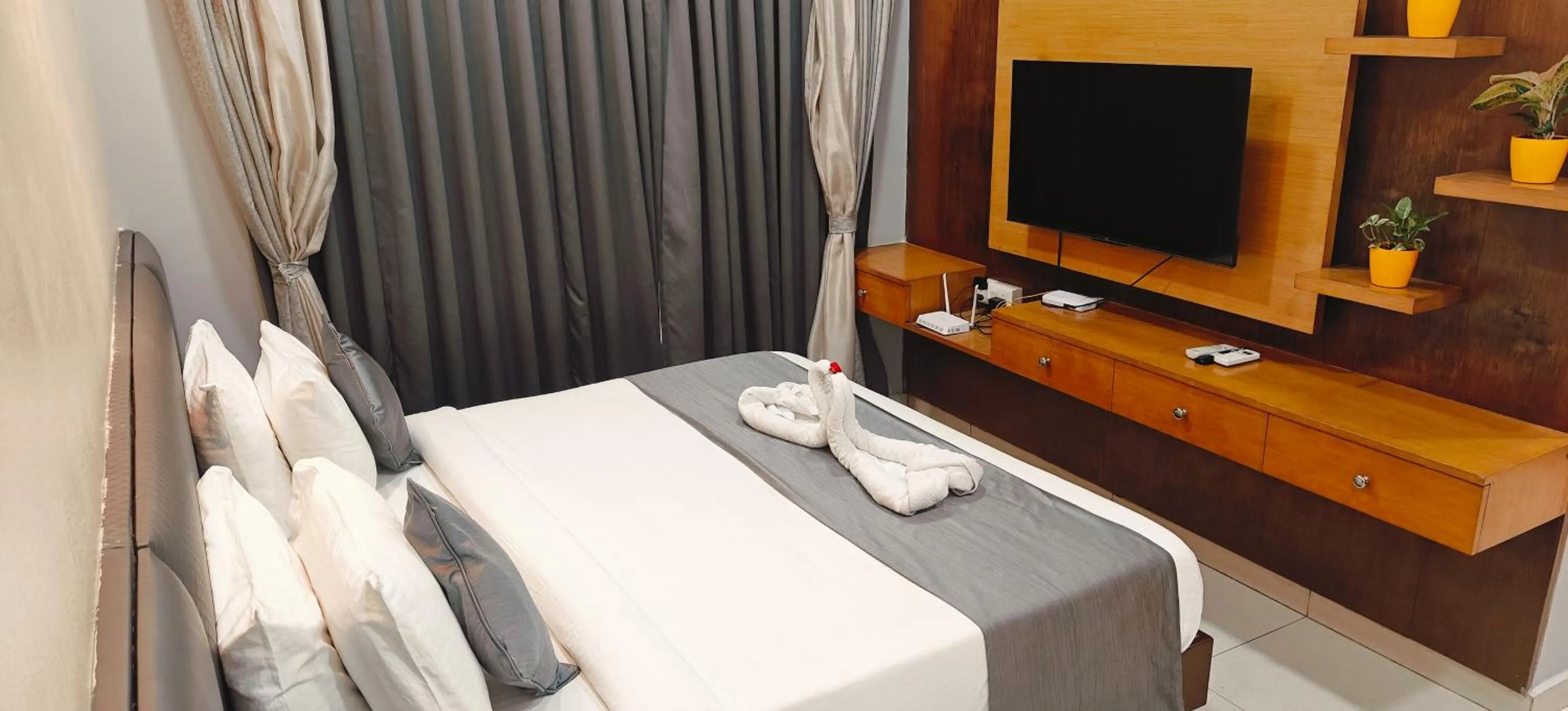 Bed in PGC Chennai Resort & Club By SSS