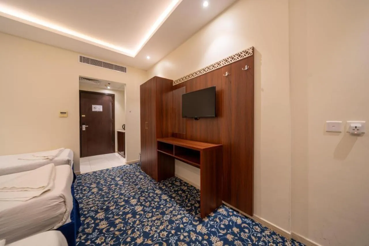 TV and multimedia, Bed in Waseem Al Azizia Hotel