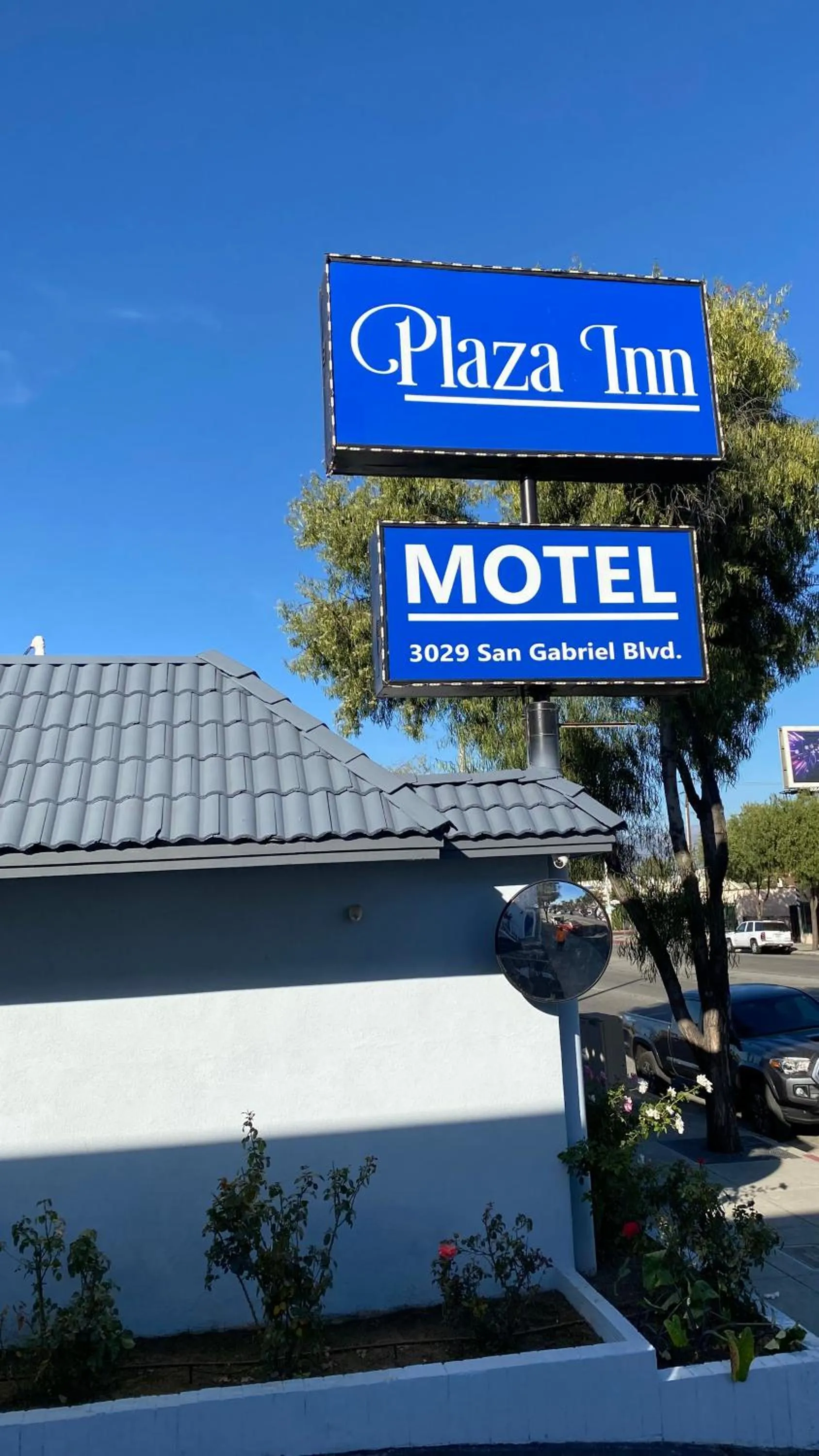 Property logo or sign in Plaza Inn Motel - Los Angeles area