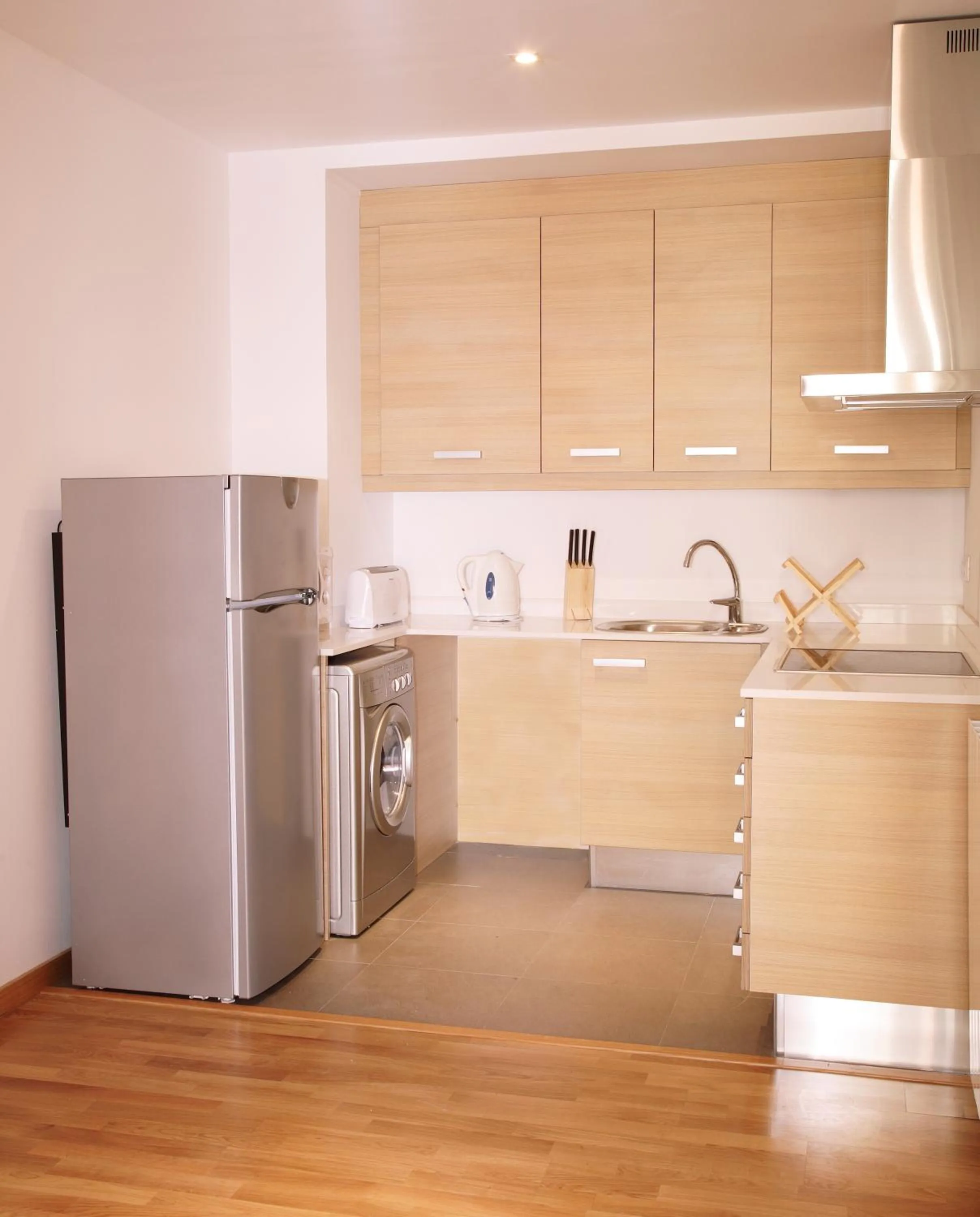 Kitchen or kitchenette in MH Apartments Liceo