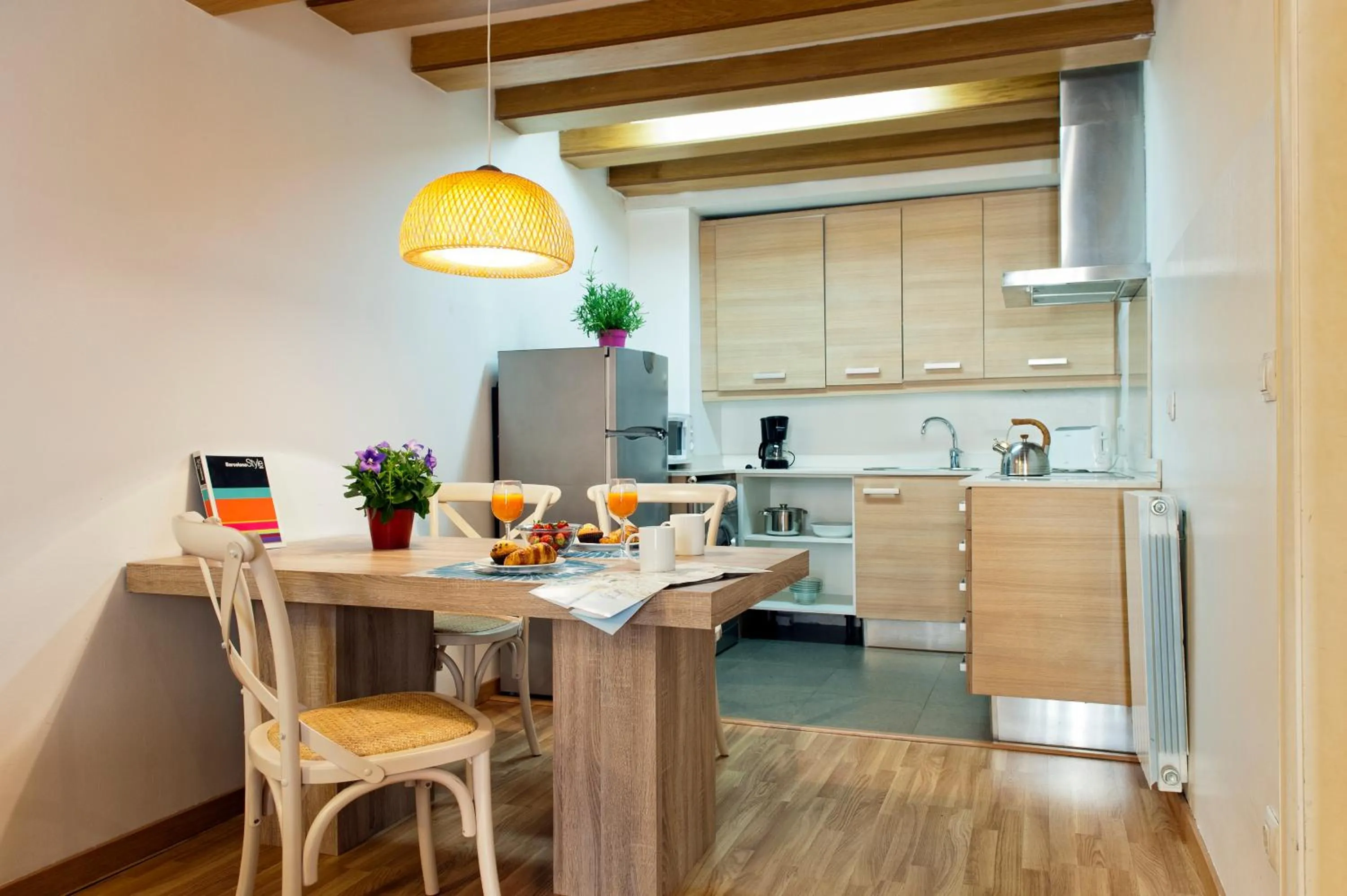 Kitchen or kitchenette in MH Apartments Liceo