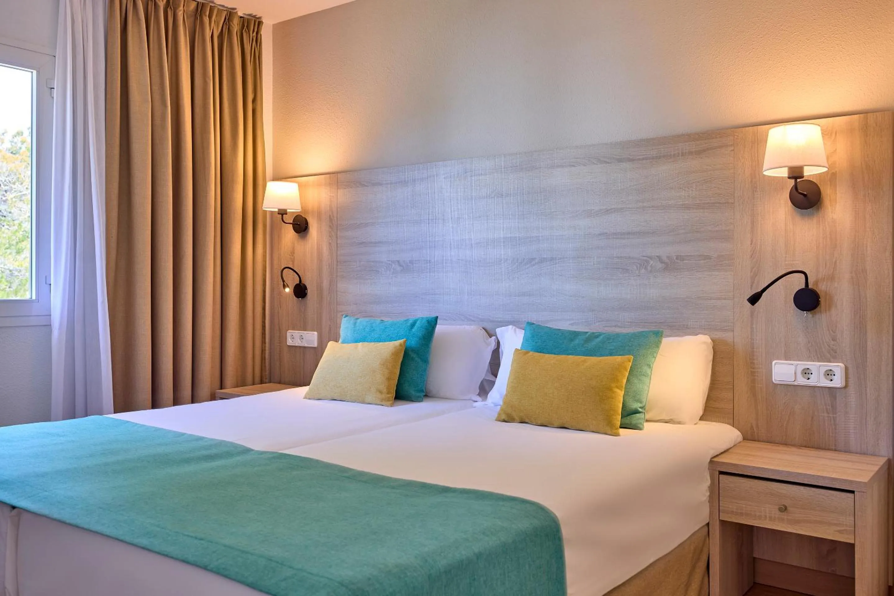 Bed in Universal Apartamentos Laguna Garden