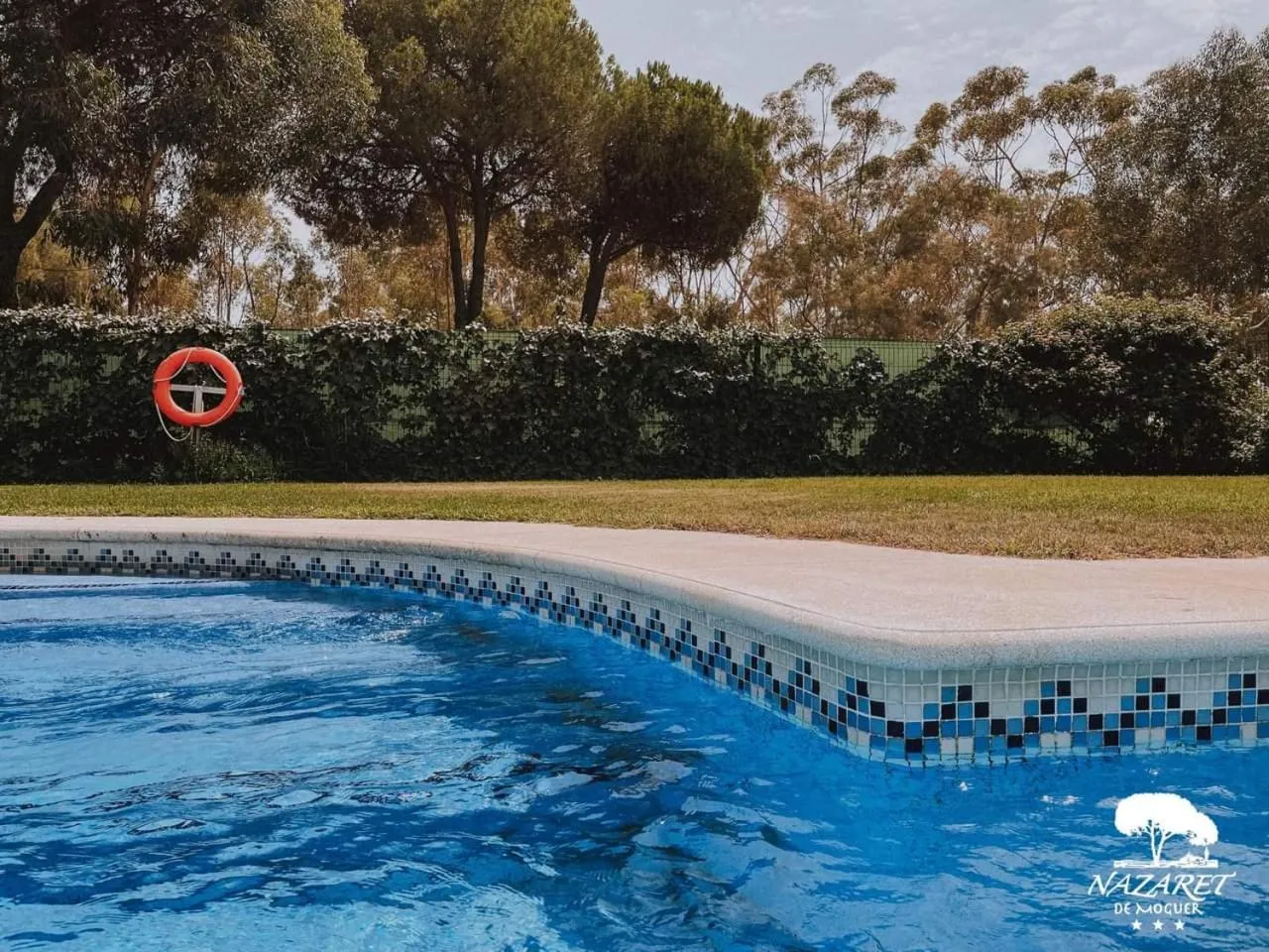 Swimming pool in Complejo Turístico Rural Nazaret De Moguer