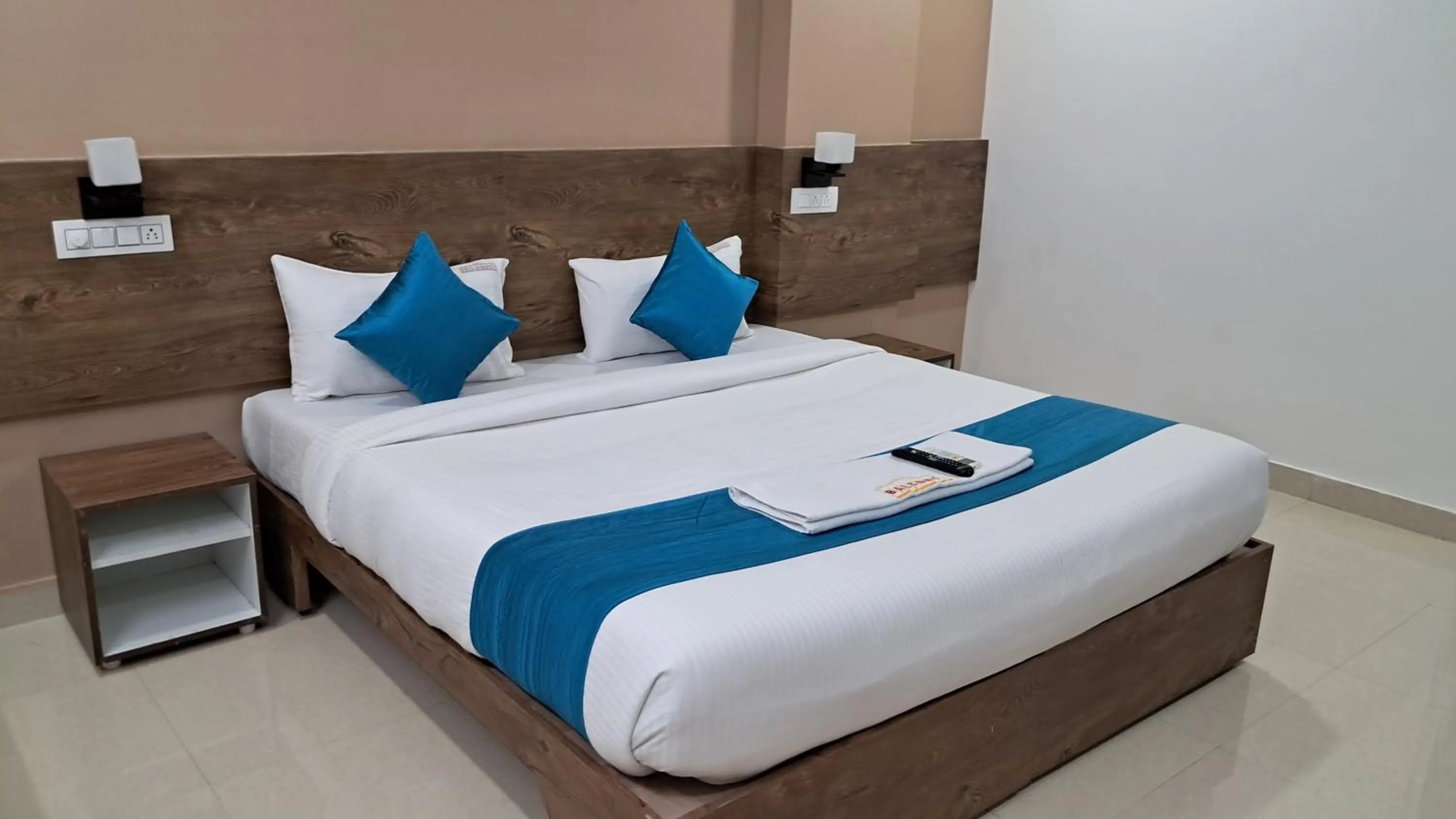 Bed in The Balcony Hotel