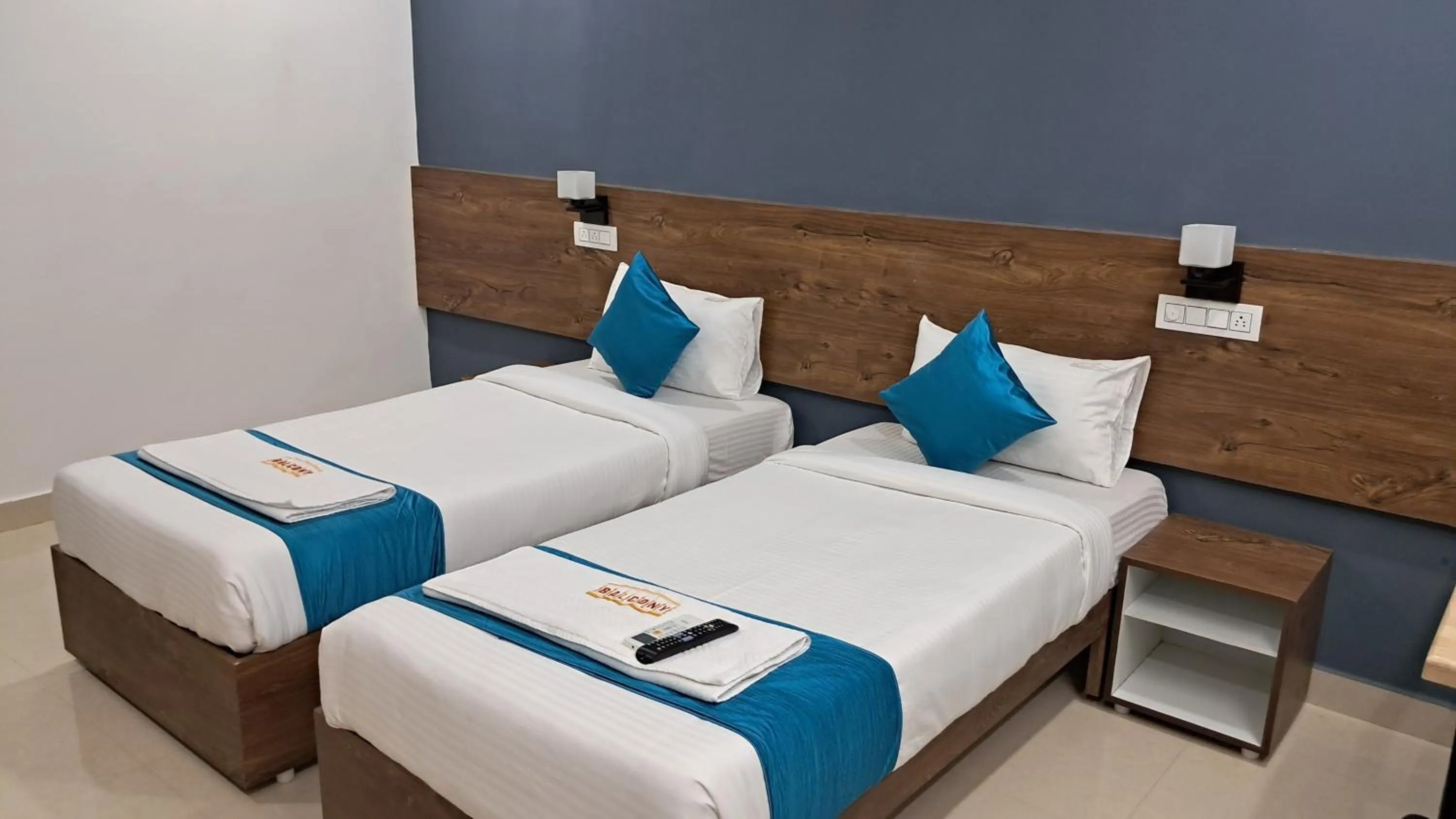 Bed in The Balcony Hotel