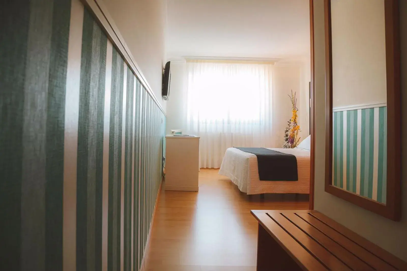 Bed in Hotel Lombiña Bed in Hotel Lombiña