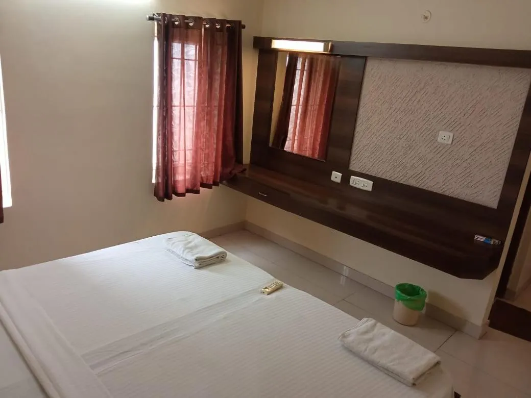 Photo of the whole room, Bed in Chetinaad Courtyard Gandhipuram by Centre Park