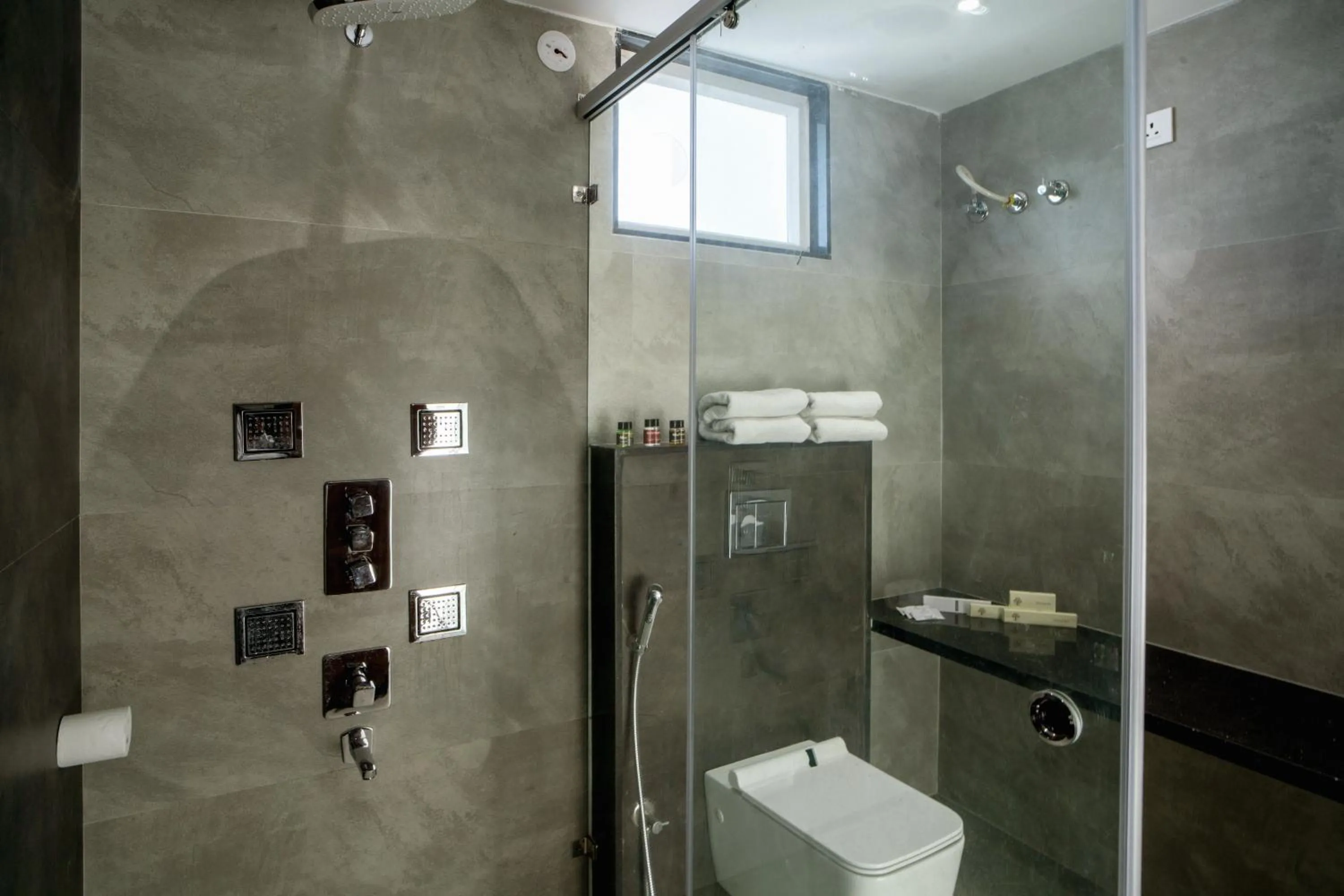 Shower in THE MANGAL VIEW RESIDENCY - A Luxury Boutique Business Hotel