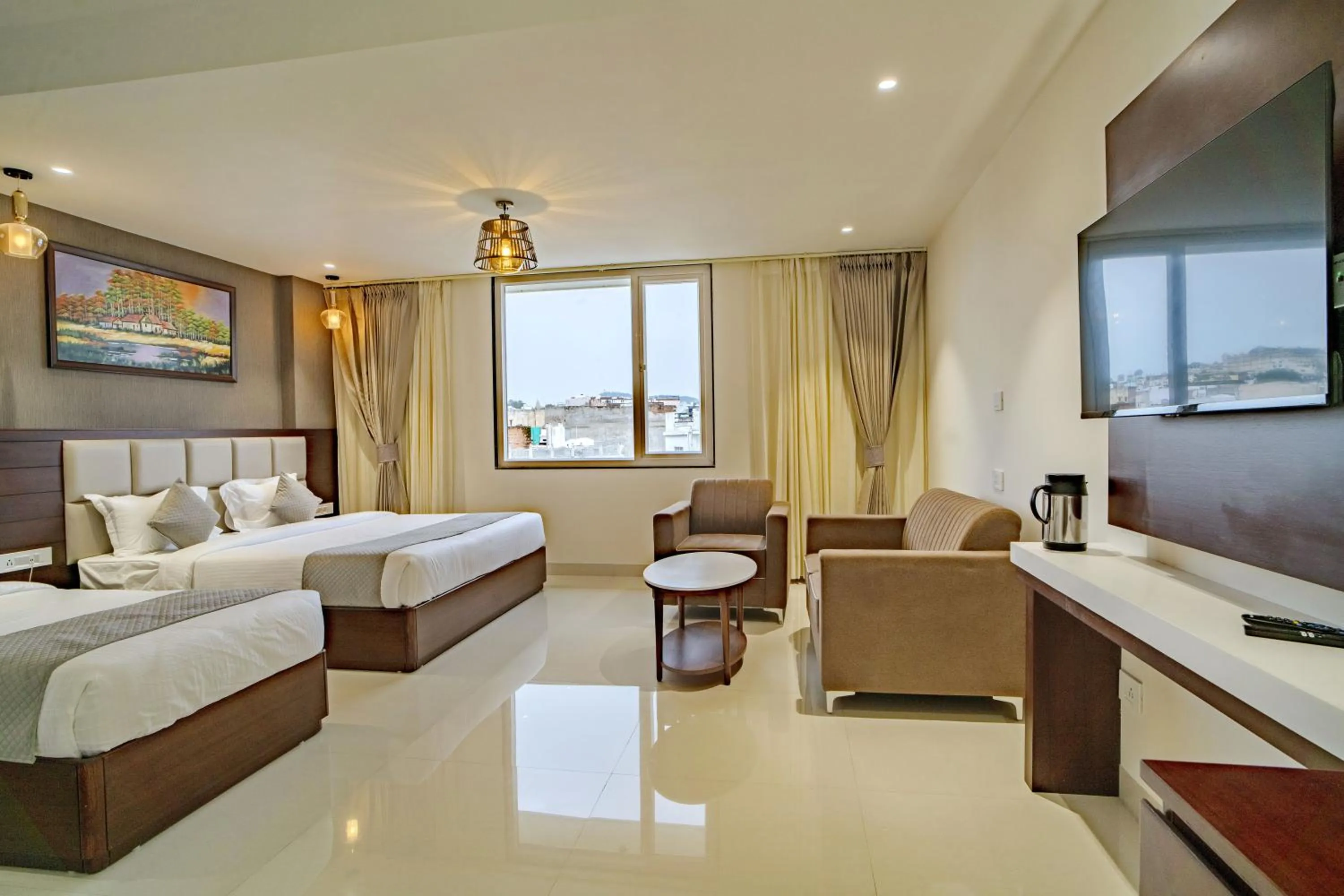Bed in THE MANGAL VIEW RESIDENCY - A Luxury Boutique Business Hotel