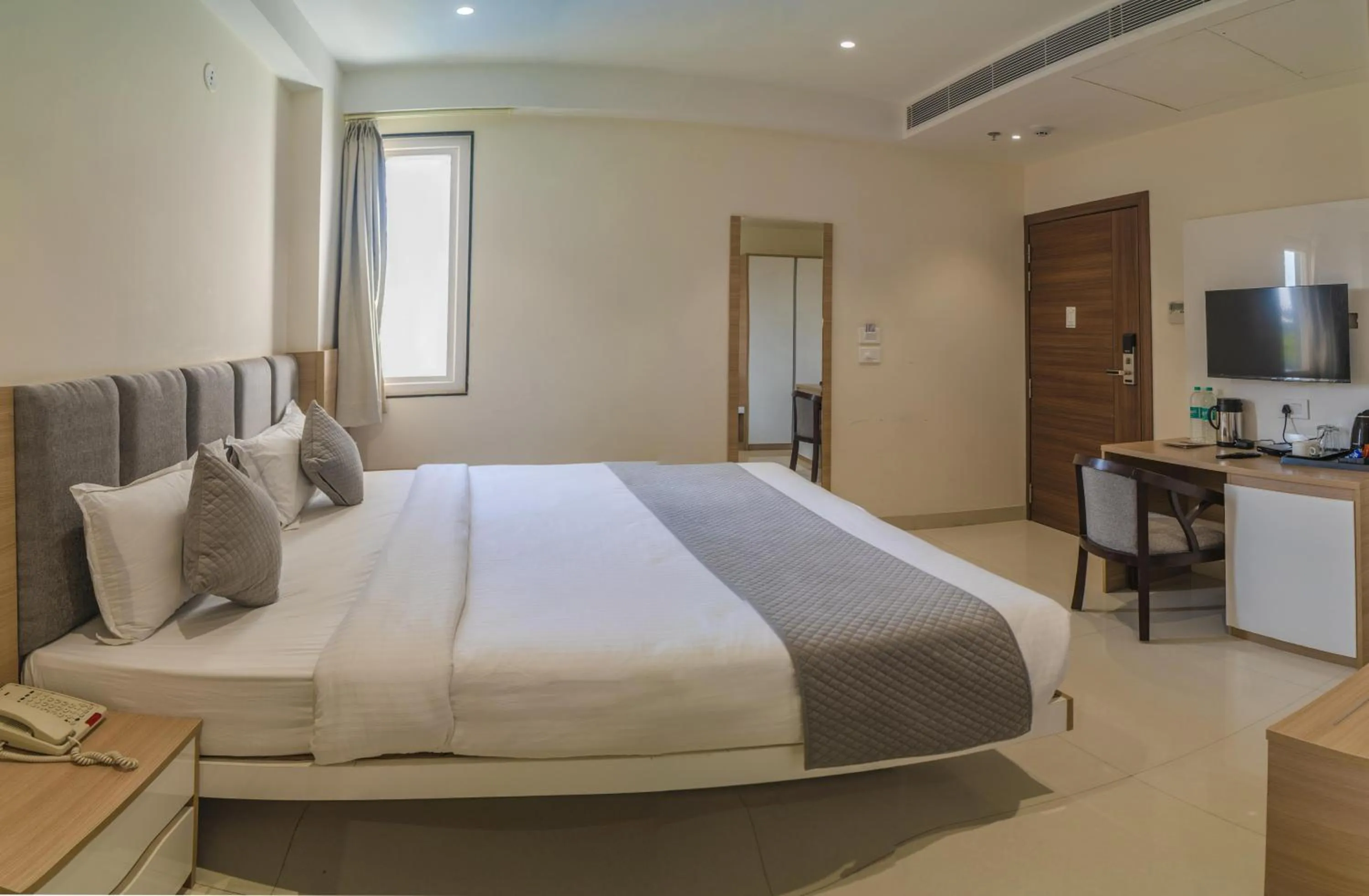 Bed in THE MANGAL VIEW RESIDENCY - A Luxury Boutique Business Hotel