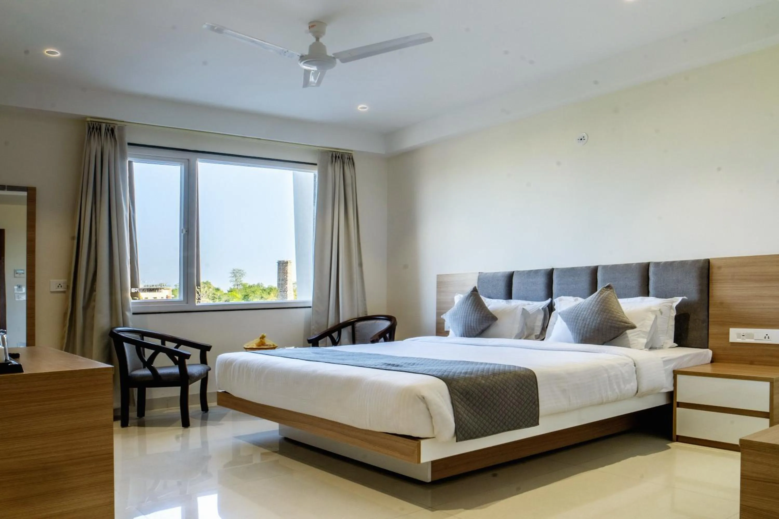 Bed in THE MANGAL VIEW RESIDENCY - A Luxury Boutique Business Hotel