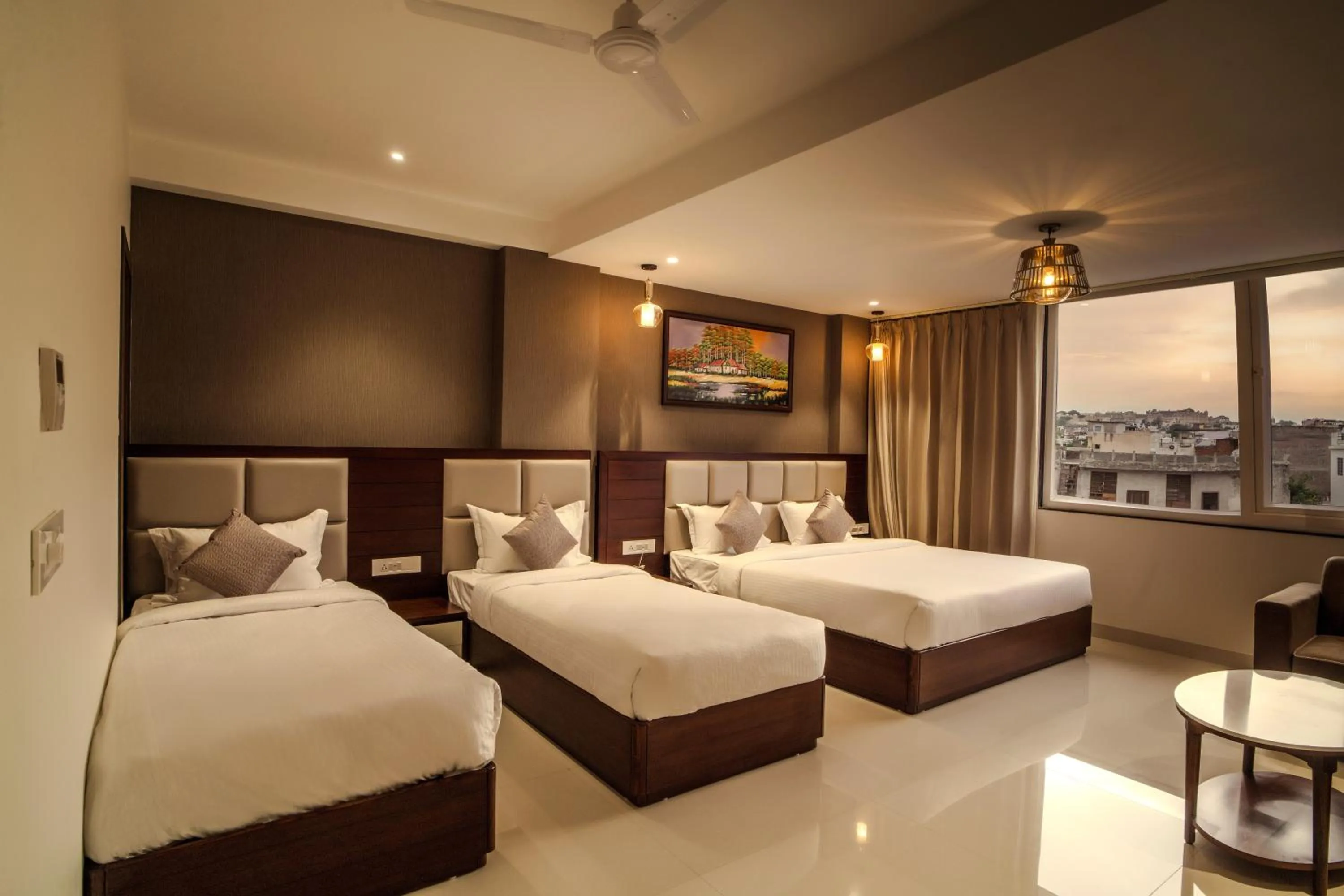 Bed in THE MANGAL VIEW RESIDENCY - A Luxury Boutique Business Hotel
