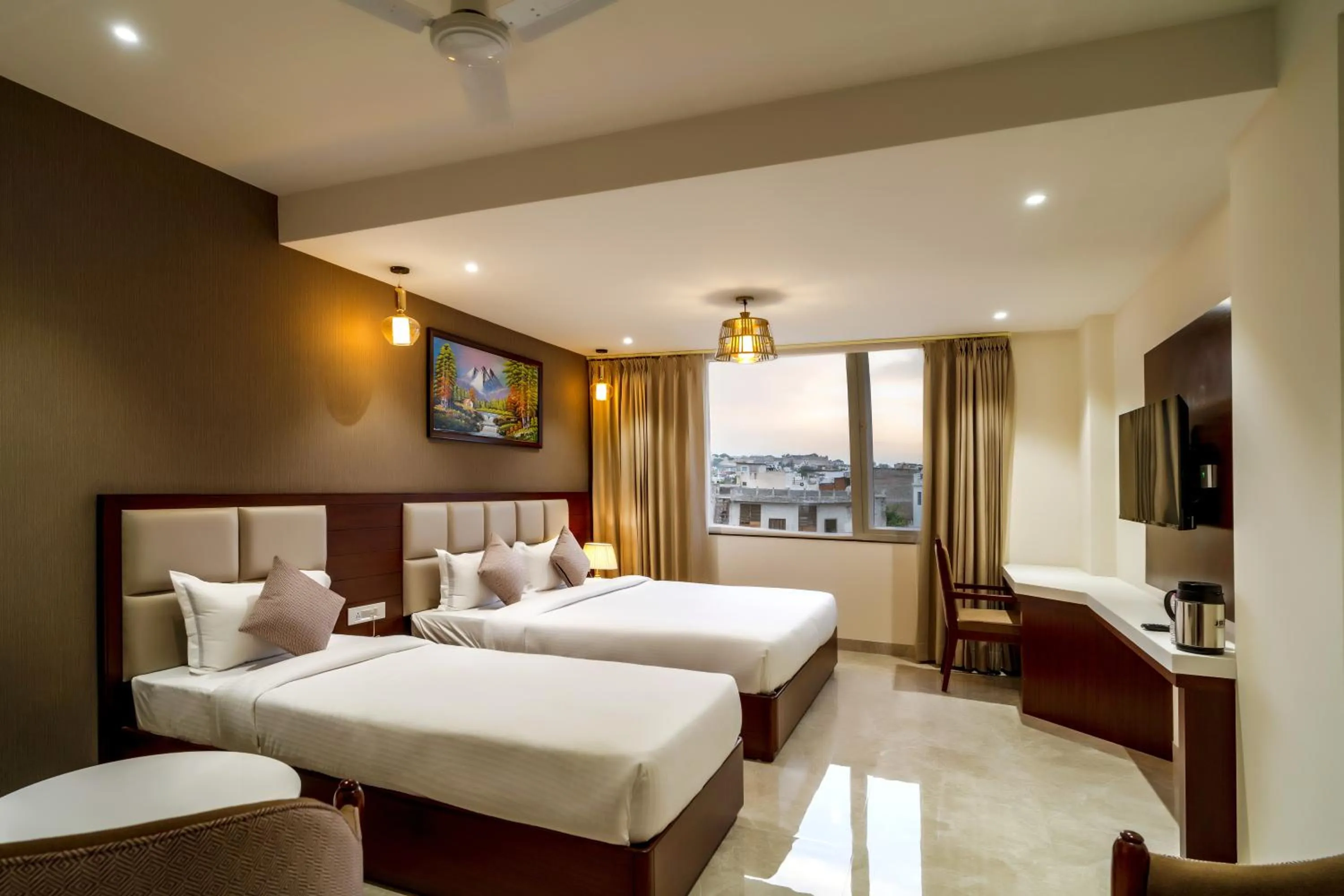 Bed in THE MANGAL VIEW RESIDENCY - A Luxury Boutique Business Hotel