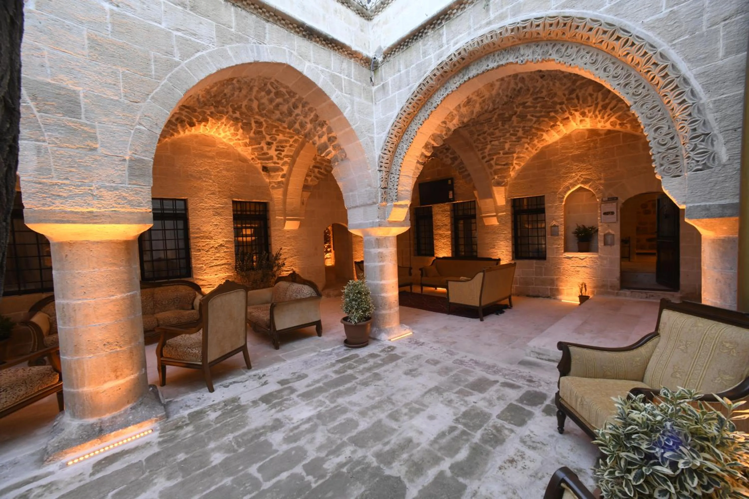 Communal lounge/ TV room in Legacy Mesopotamia Hotel