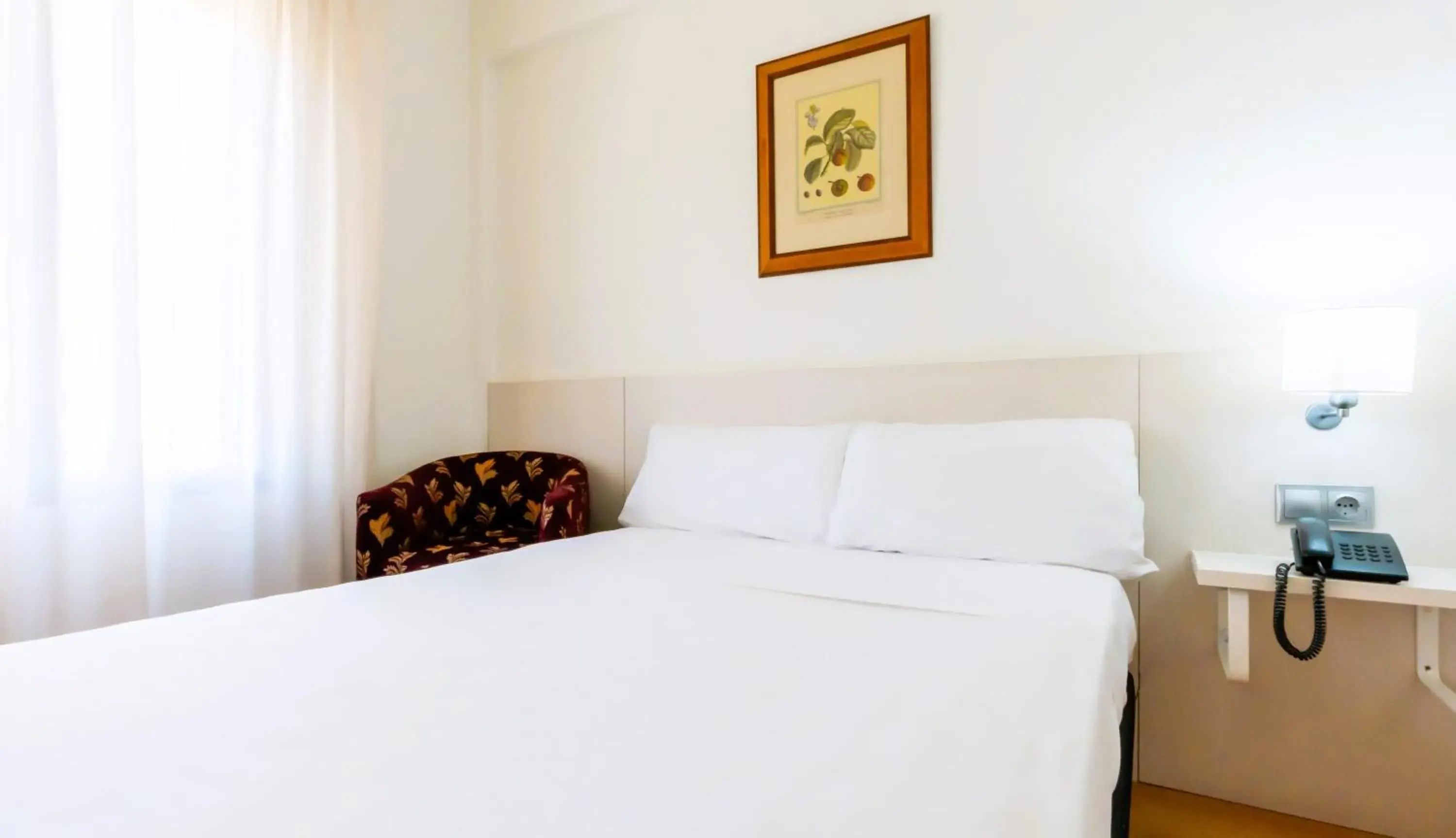 Bed in Hotel Palacios Bed in Hotel Palacios