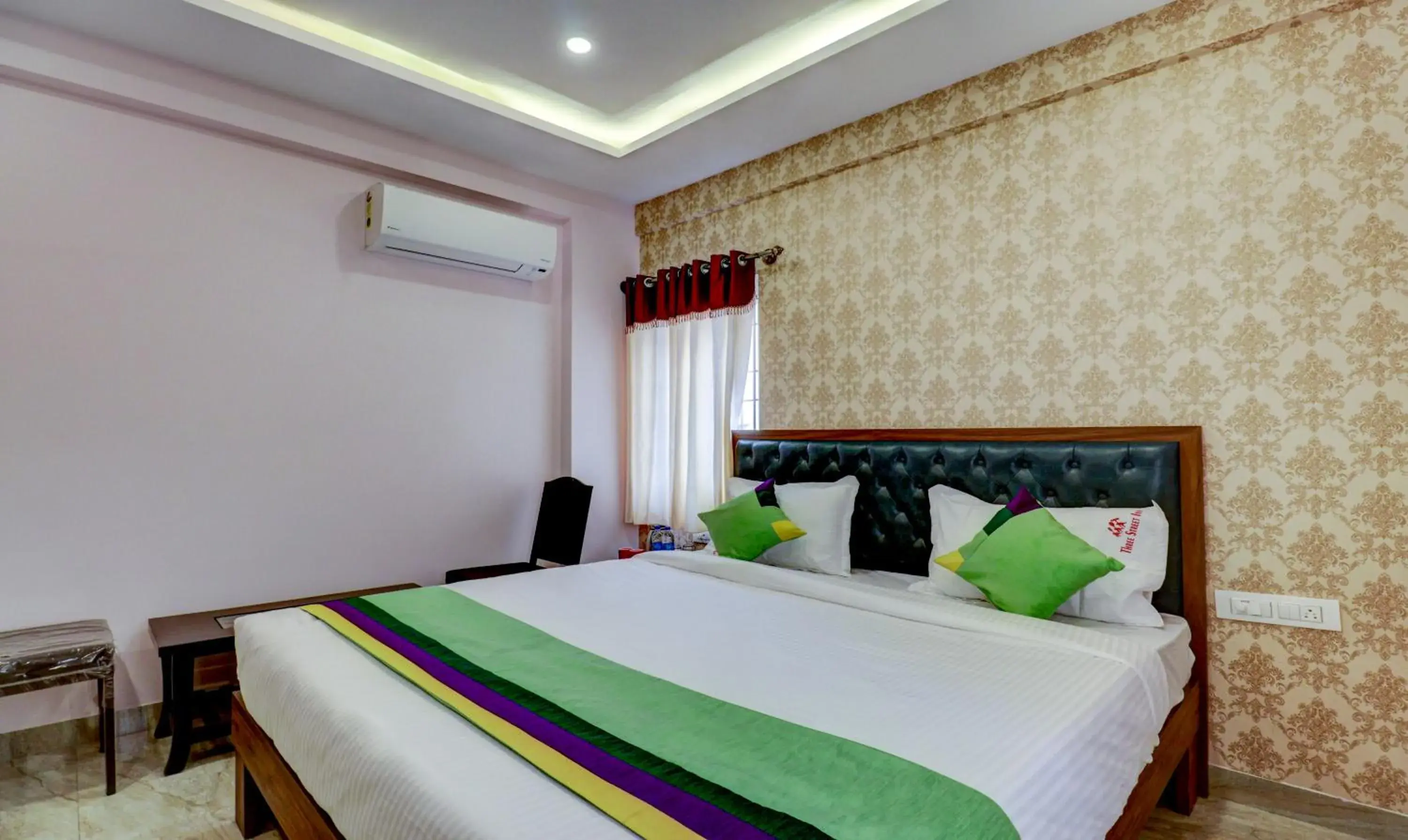 Bedroom, Bed in Treebo Three Street Inn Bedroom, Bed in Treebo Three Street Inn