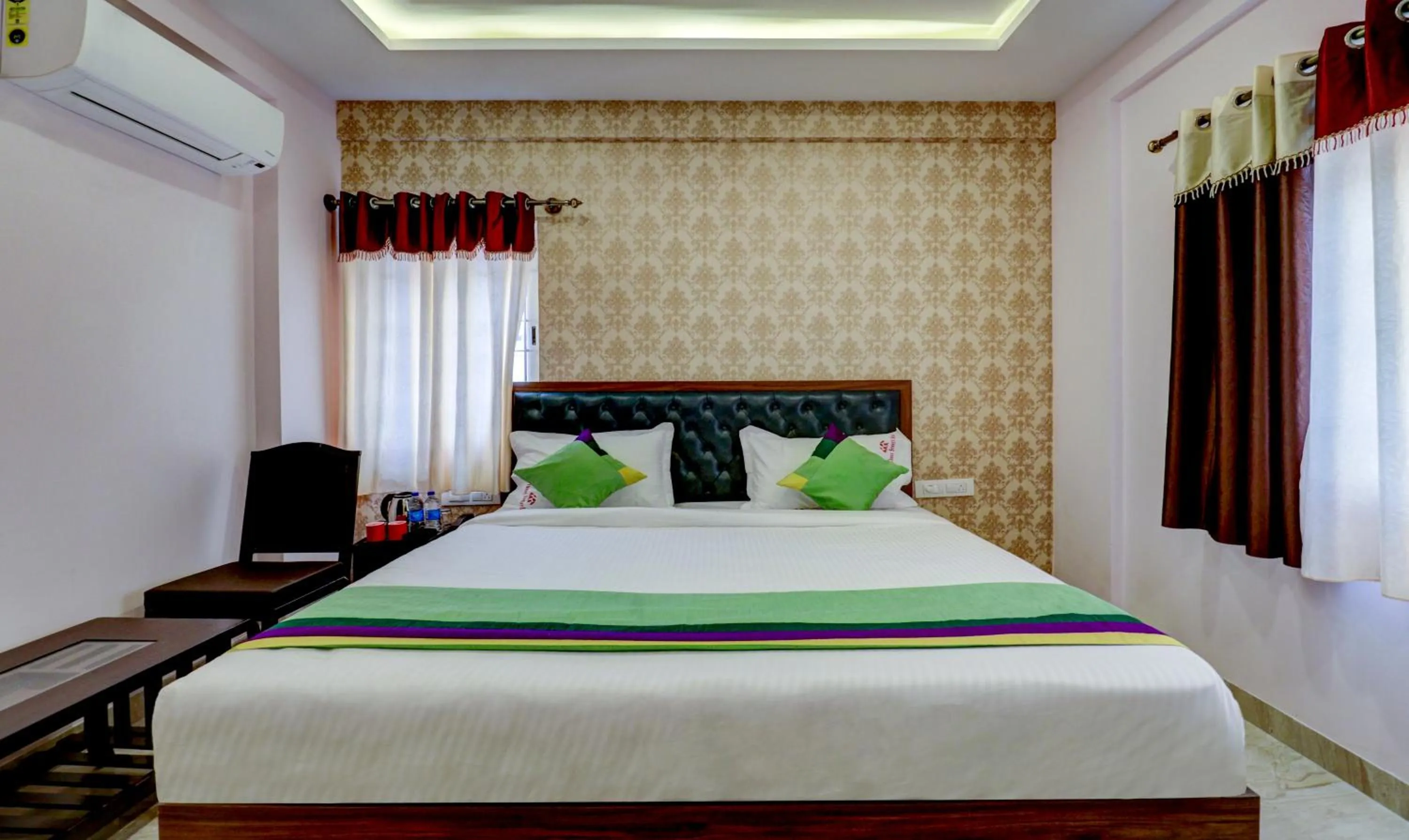 Bedroom, Bed in Treebo Three Street Inn