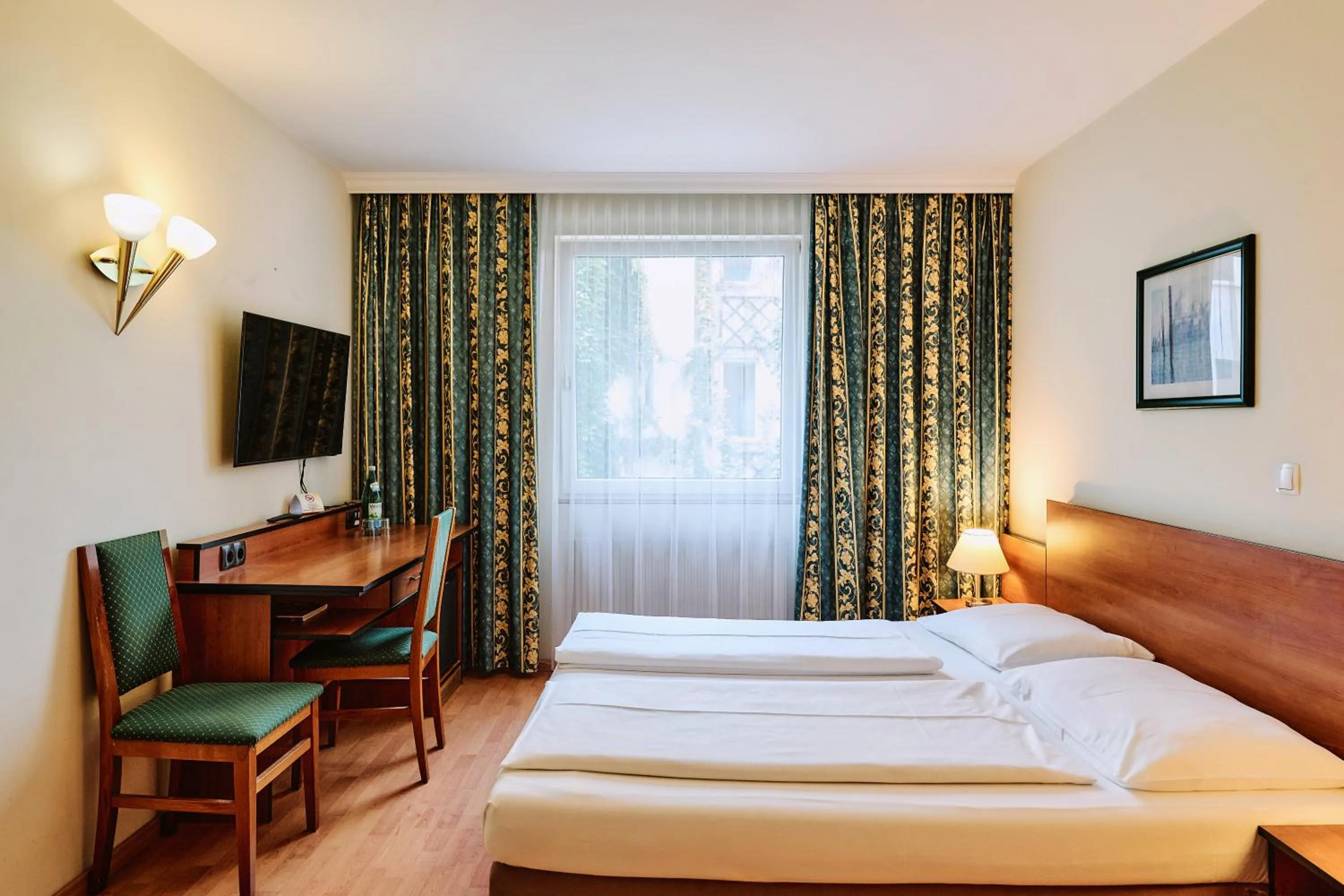 Bed in Hotel Deutschmeister