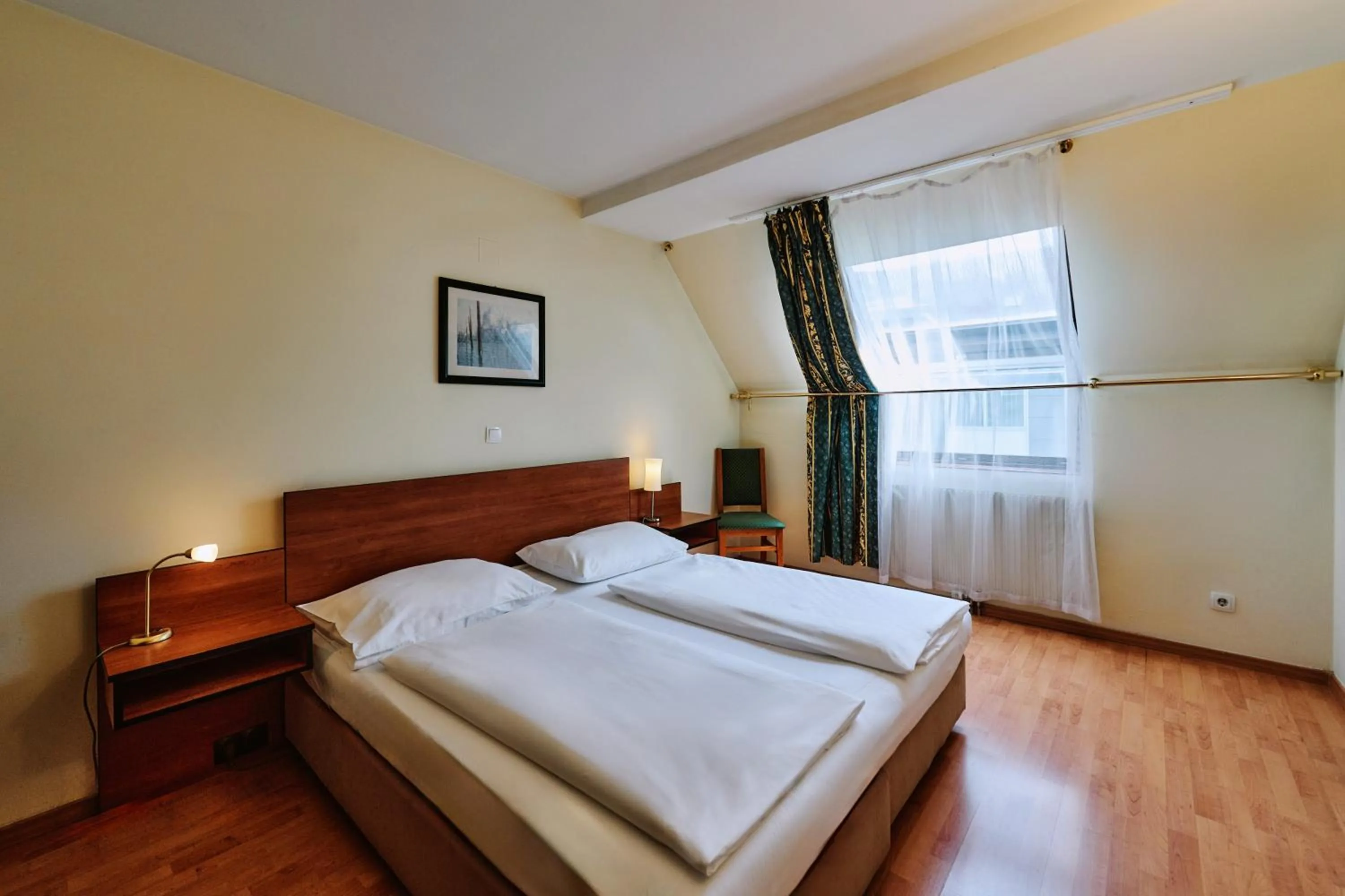 Bed in Hotel Deutschmeister