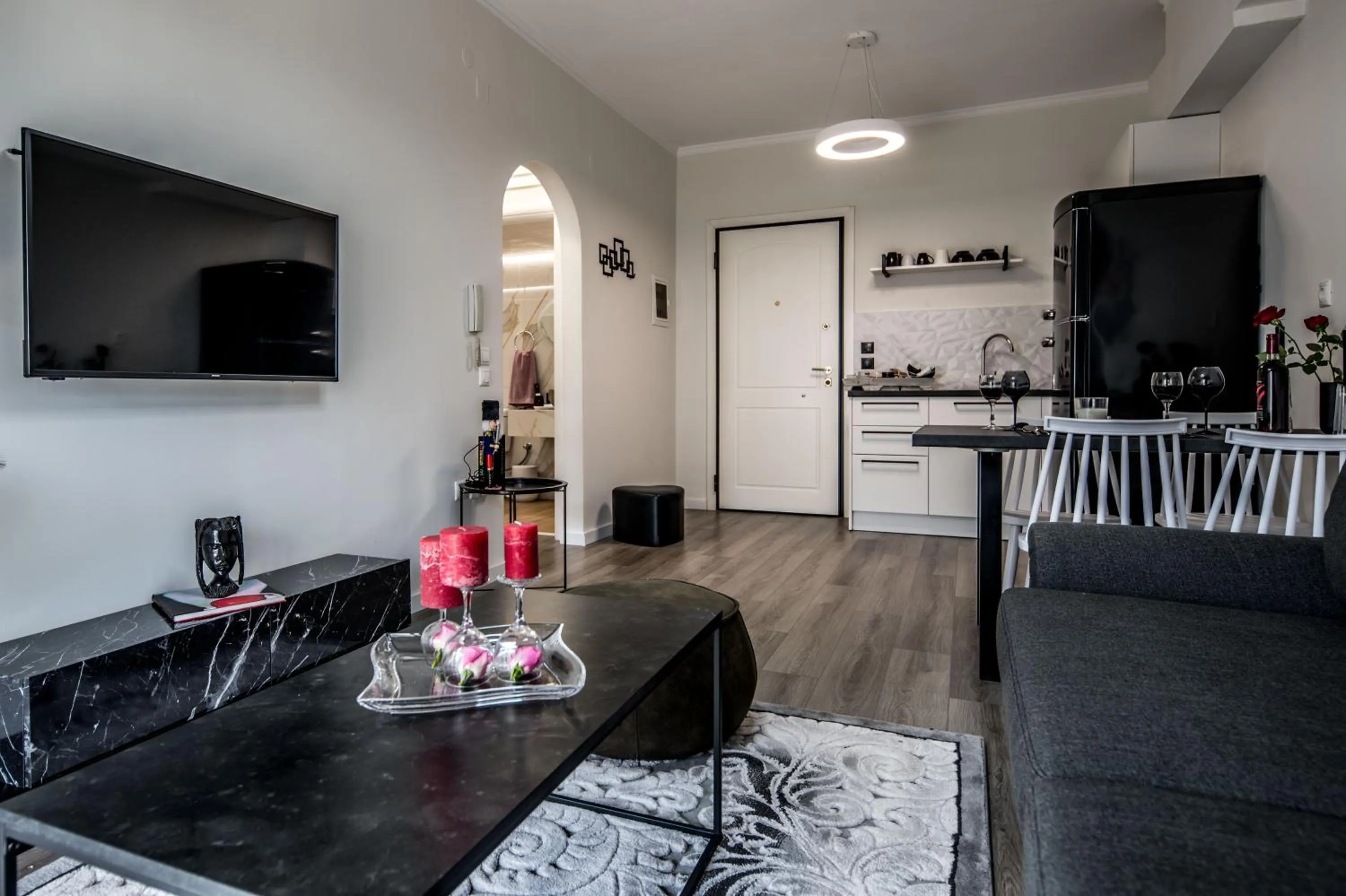 TV and multimedia in Escape Luxury Apartment