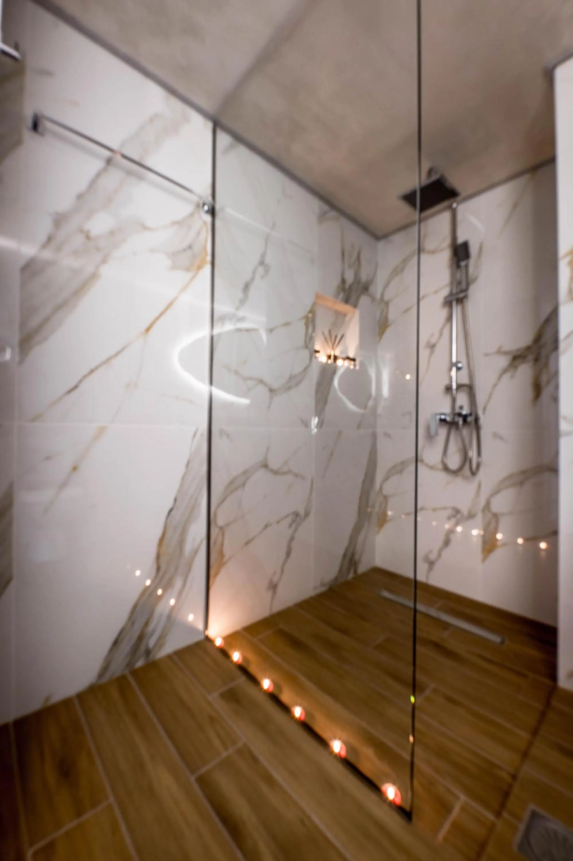 Shower in Escape Luxury Apartment