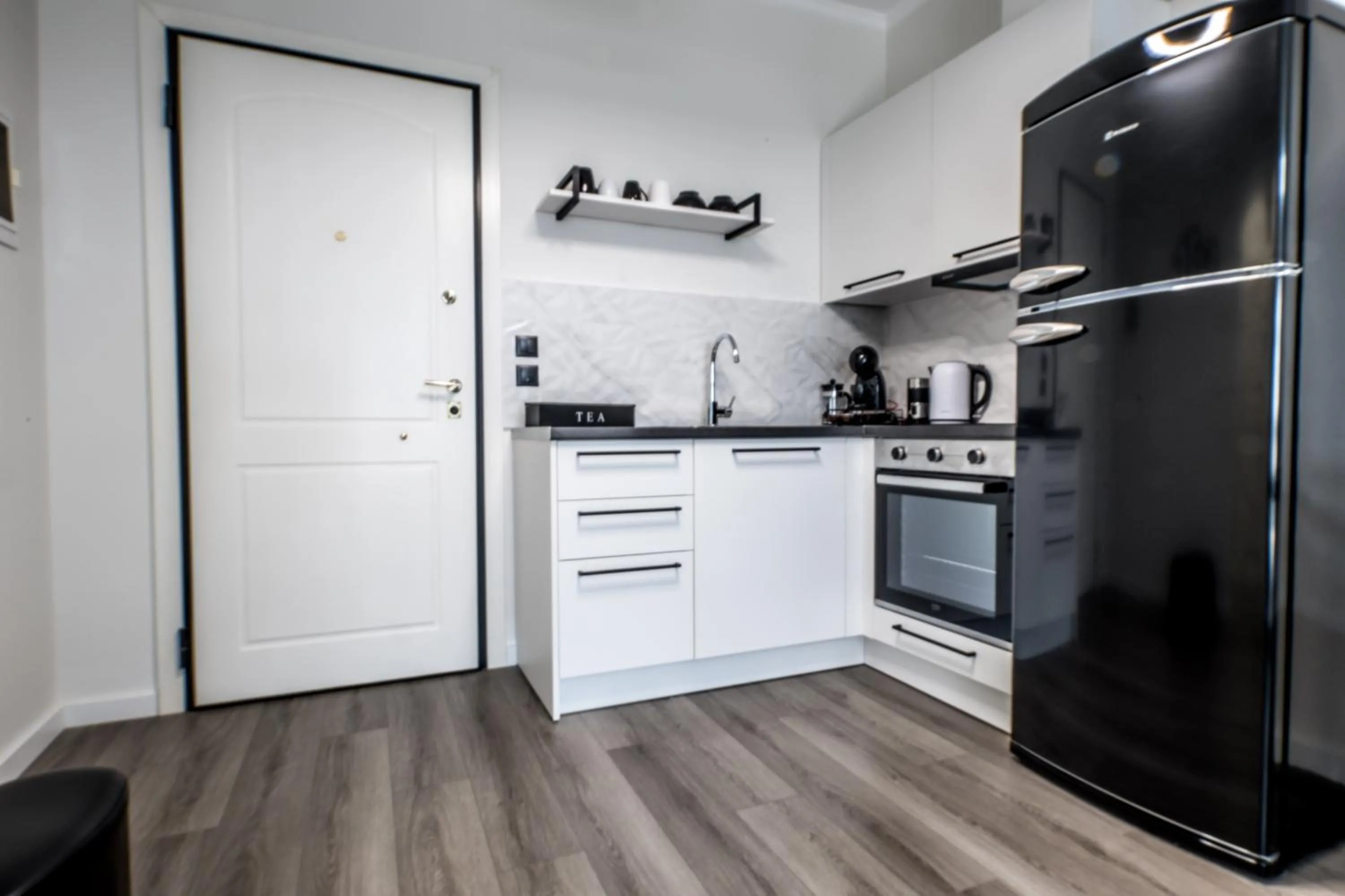 Kitchen or kitchenette in Escape Luxury Apartment