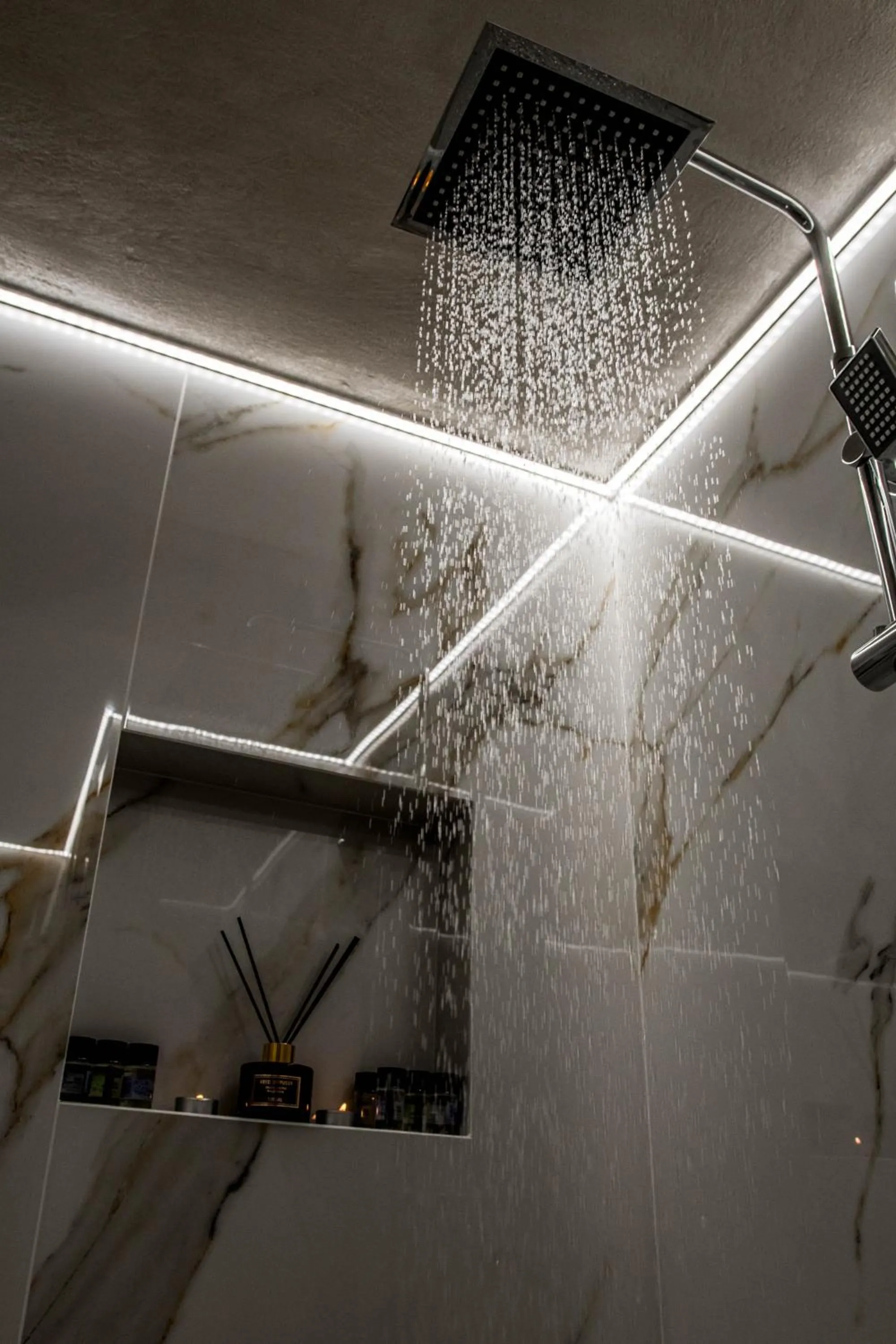 Shower in Escape Luxury Apartment