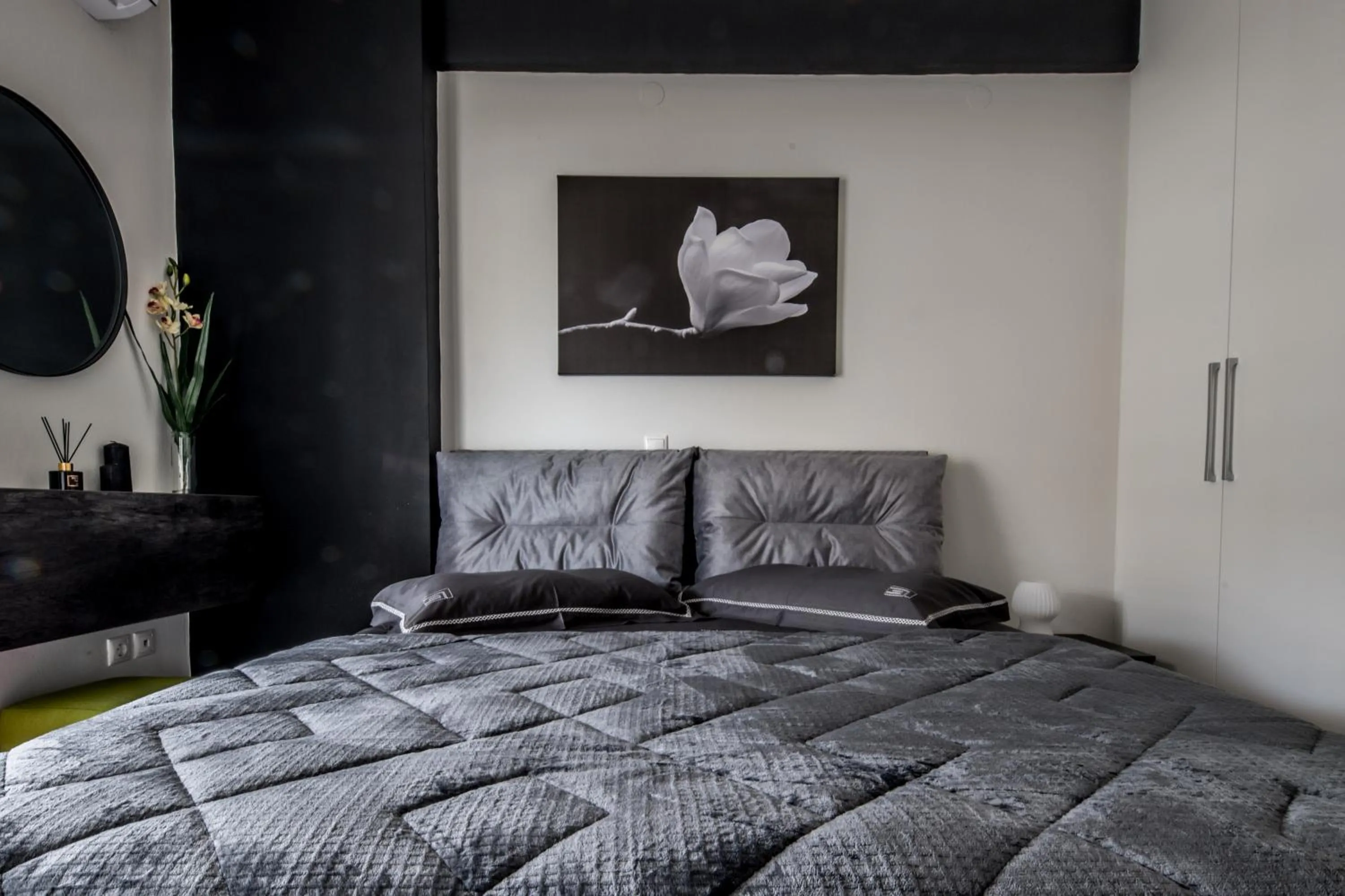 Bed in Escape Luxury Apartment