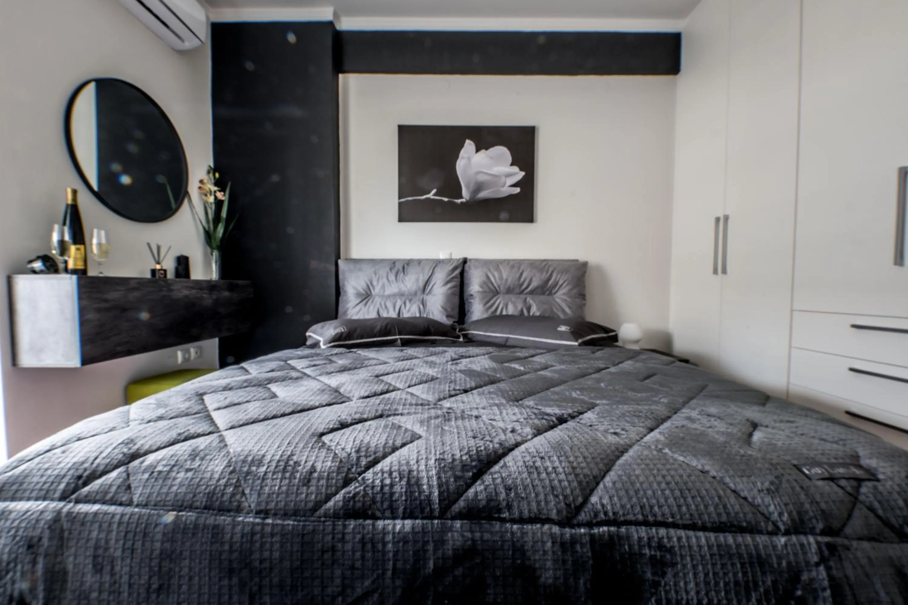 Bed in Escape Luxury Apartment