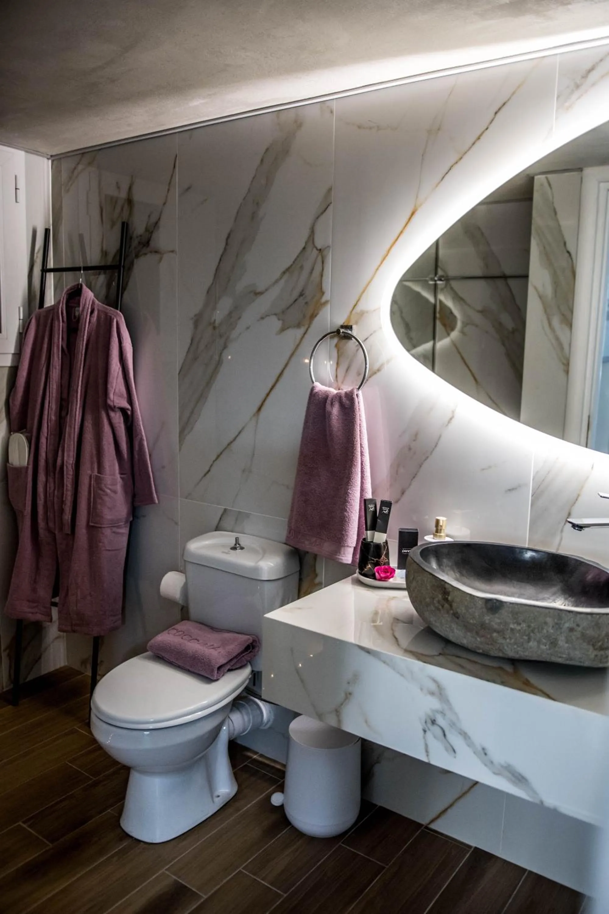 Toilet in Escape Luxury Apartment