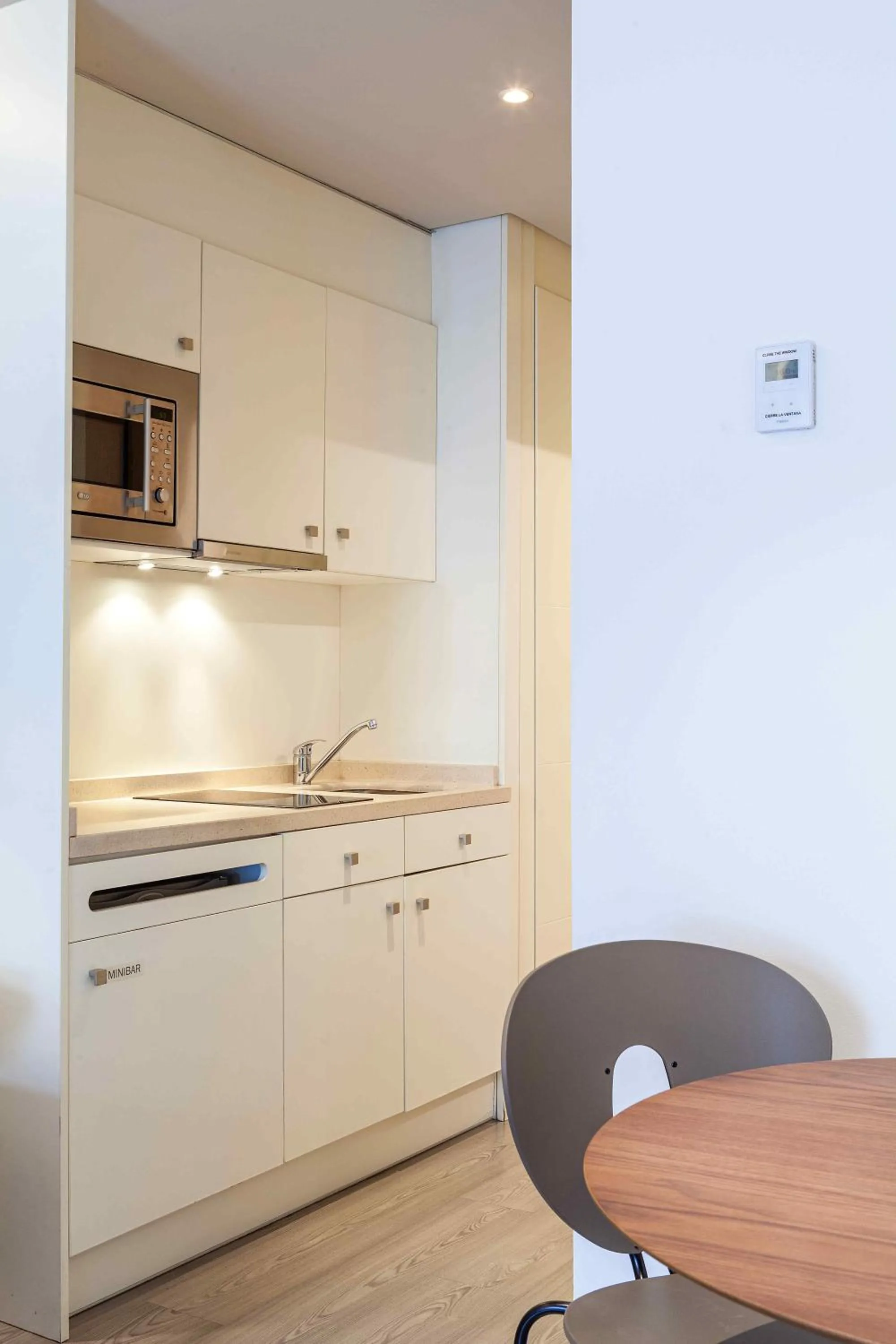 Kitchen or kitchenette in Suites Viena Plaza de España