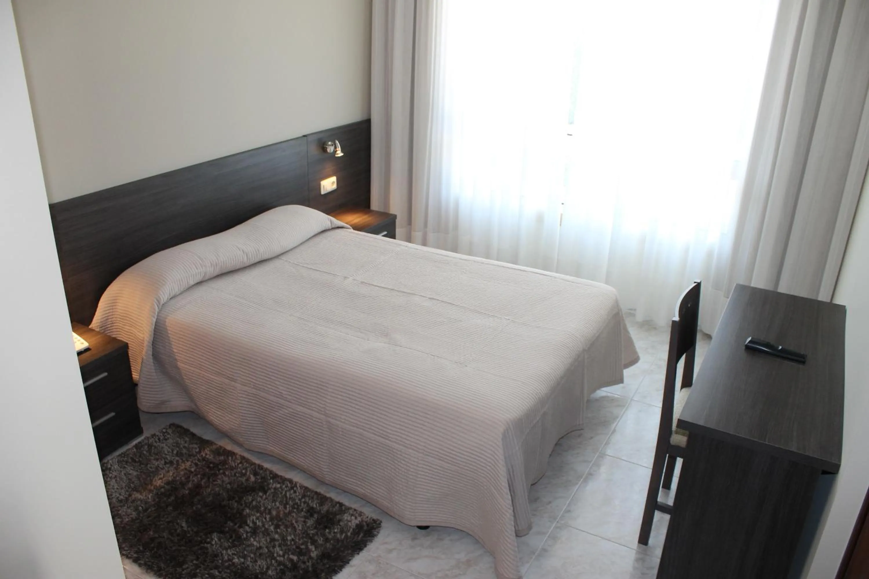 Bedroom, Bed in Hotel Susuqui