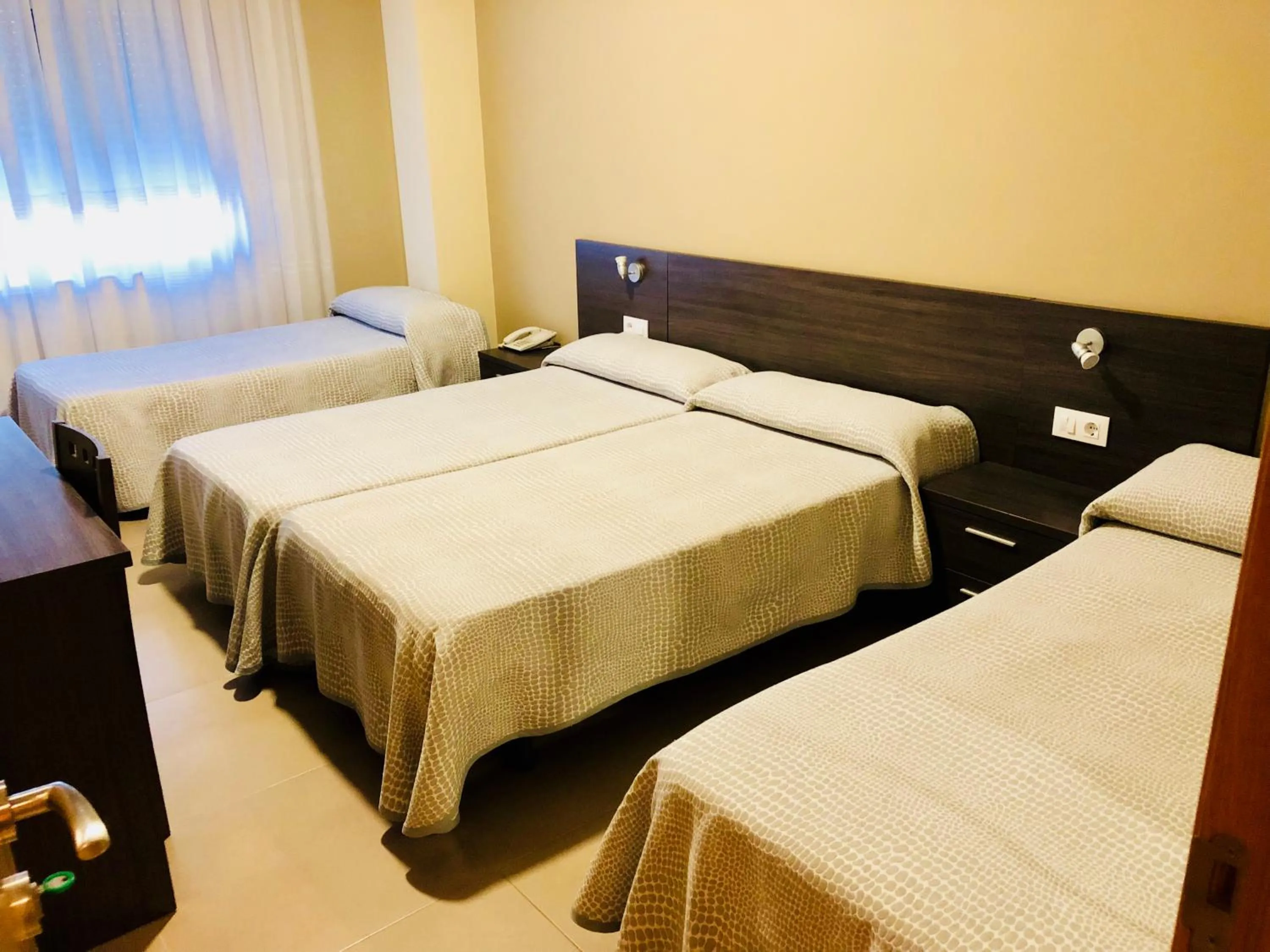 Photo of the whole room, Bed in Hotel Susuqui