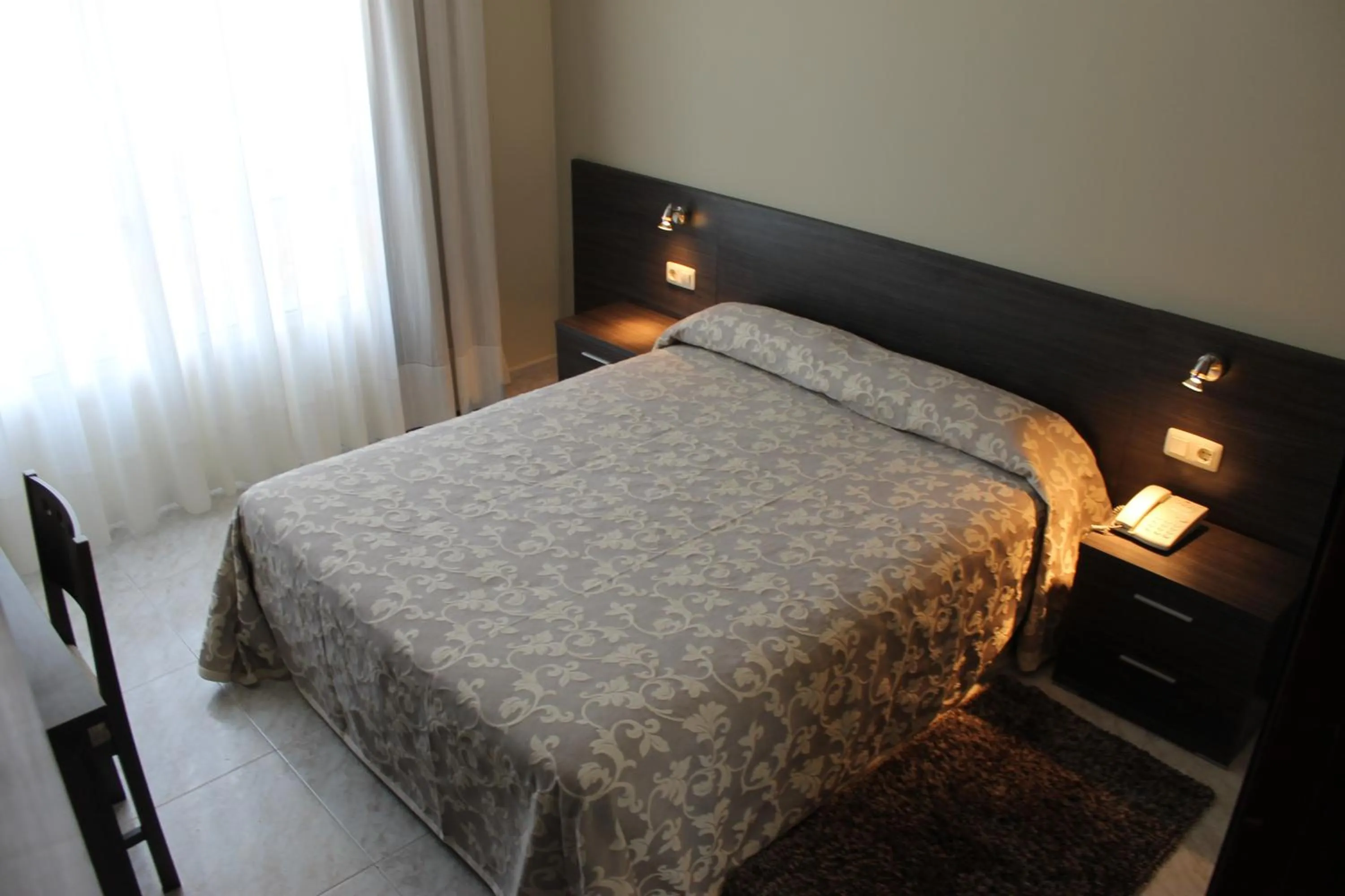 Bedroom, Bed in Hotel Susuqui