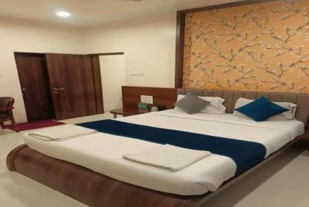Bed in Hotel Sai Sparsh