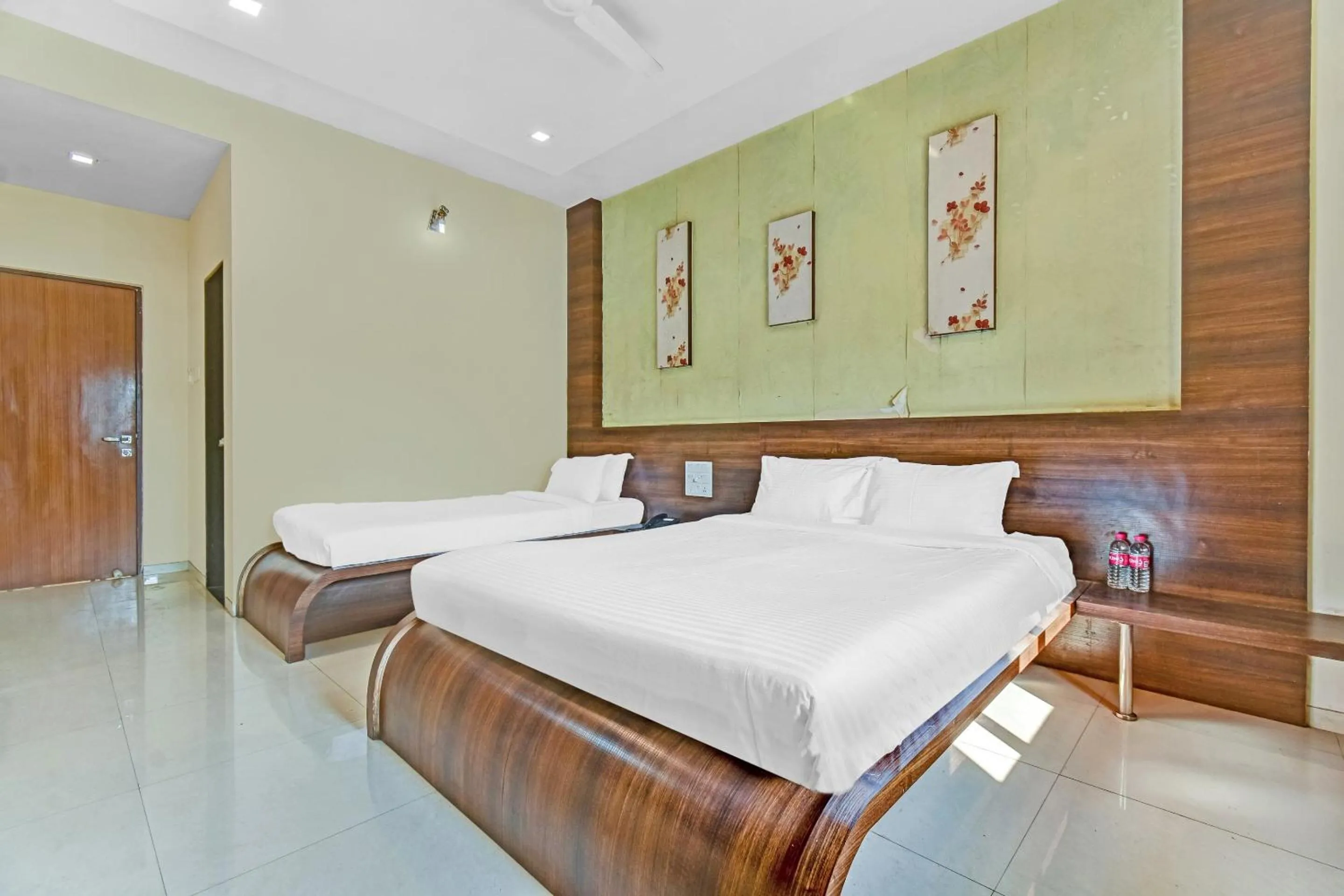 Bed in Hotel Sai Sparsh
