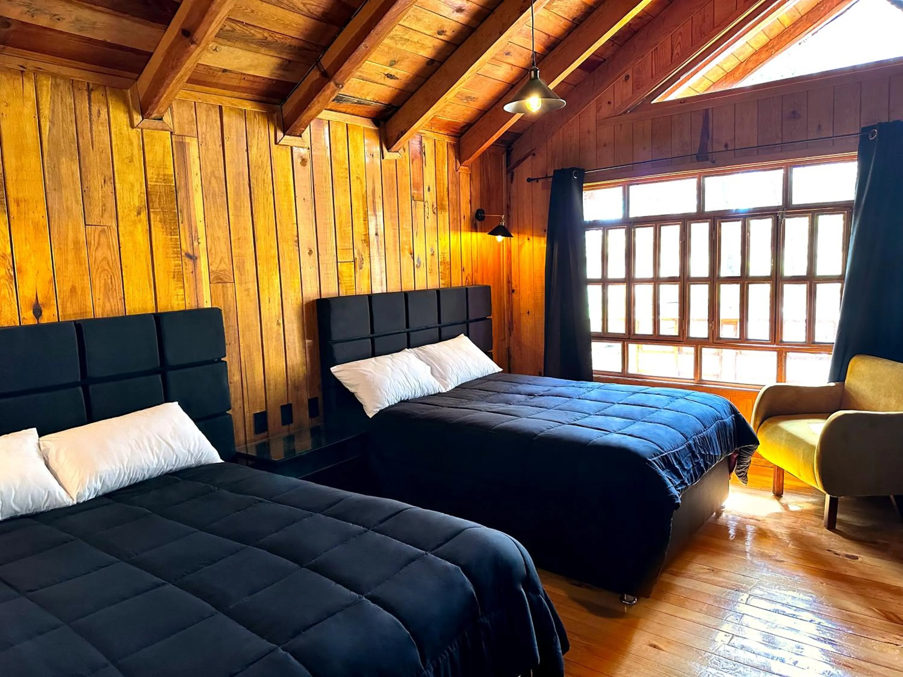 Photo of the whole room, Bed in PINE TREE Mazamitla Hotel Boutique & Cabañas