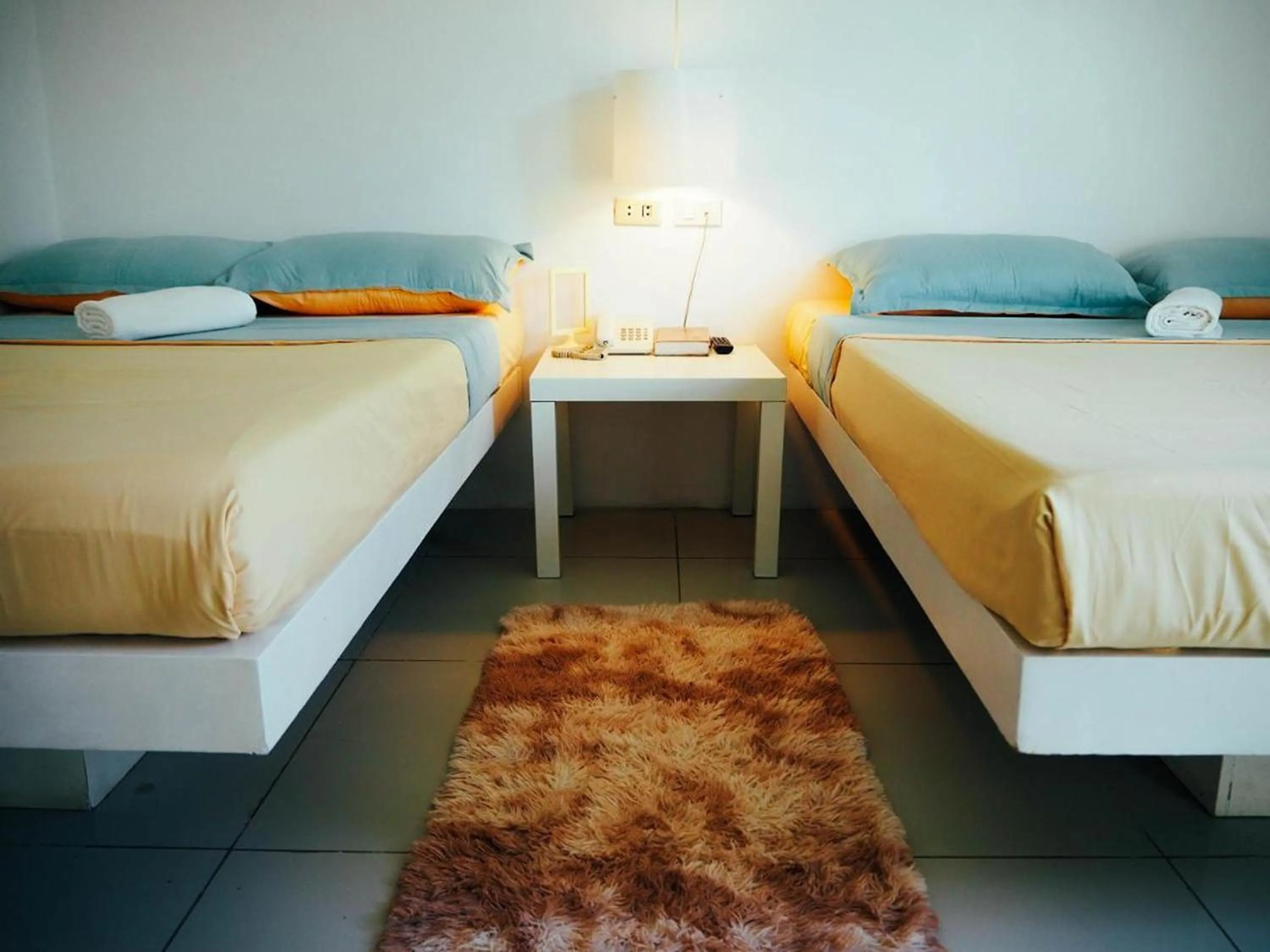 Bed in Wanderlust Bed and Breakfast Puerto Princesa