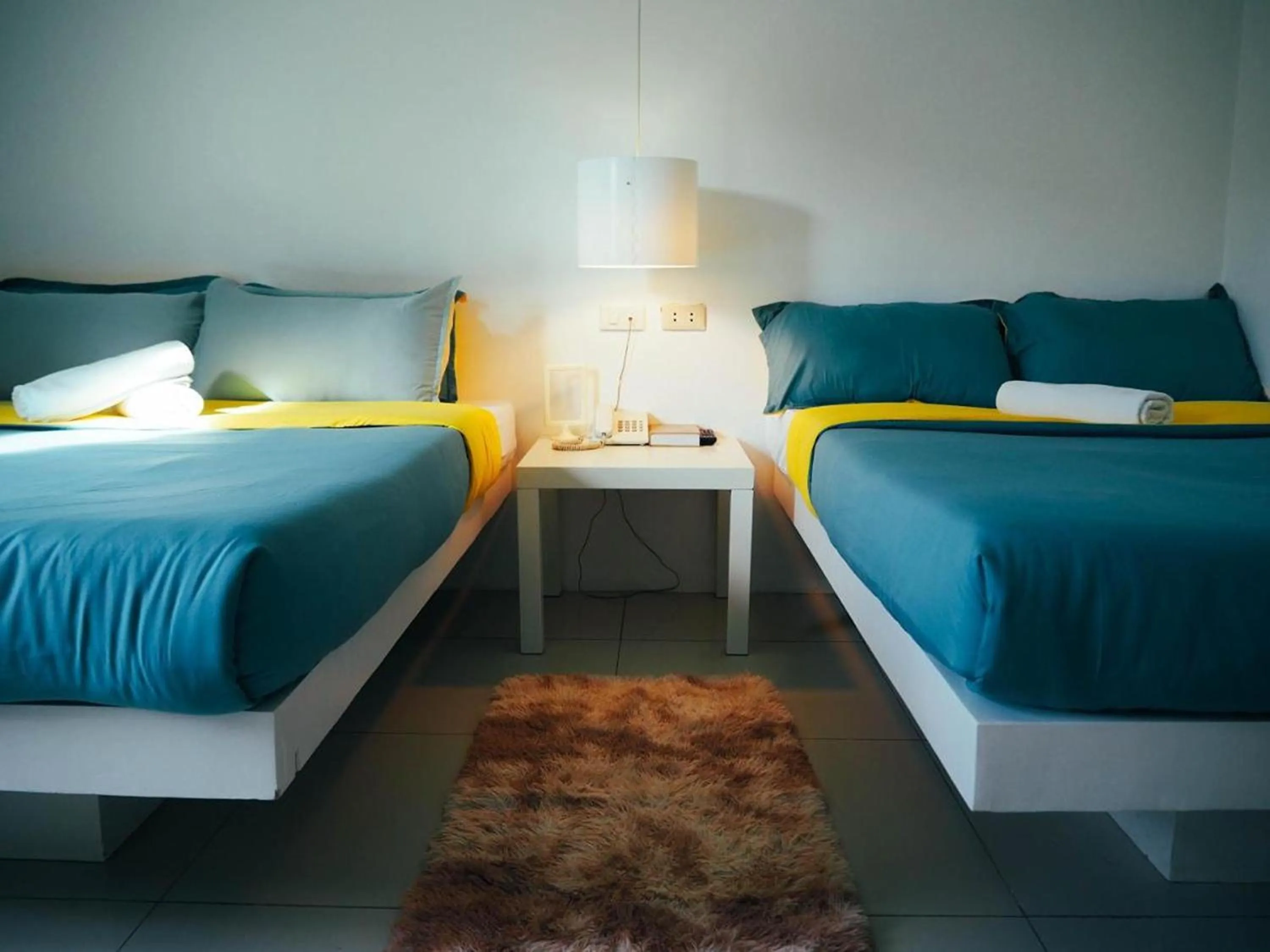 Bed in Wanderlust Bed and Breakfast Puerto Princesa