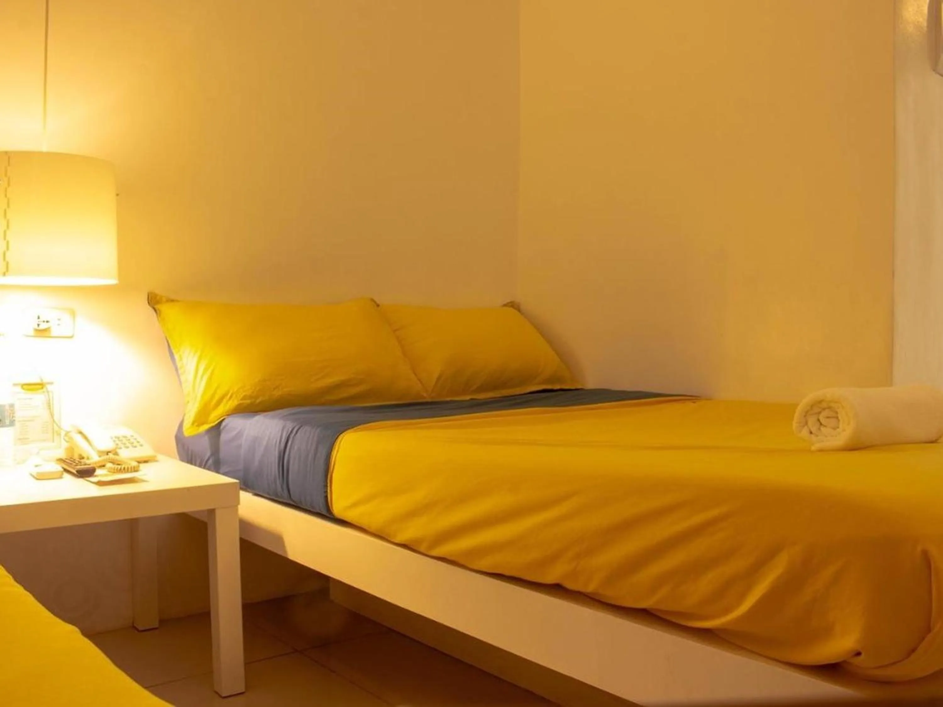 Bed in Wanderlust Bed and Breakfast Puerto Princesa