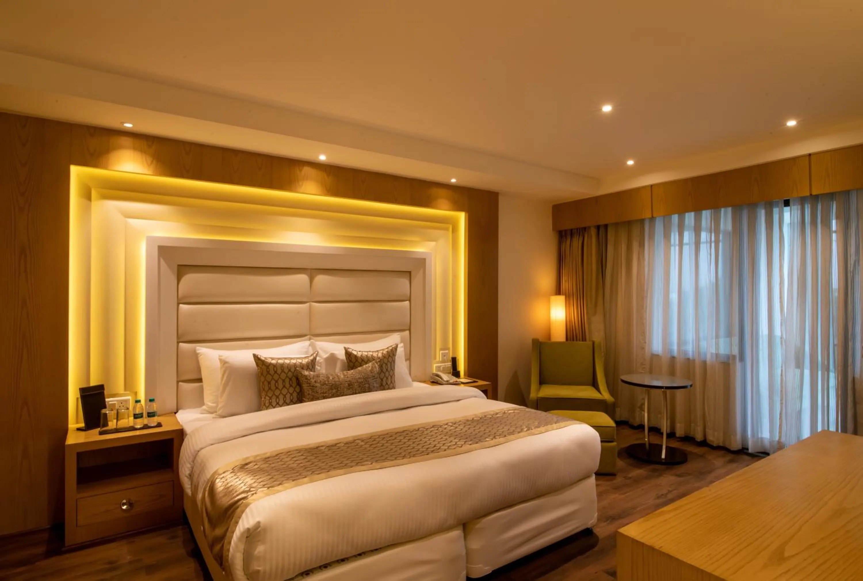 Bed in The Pristine Hotel