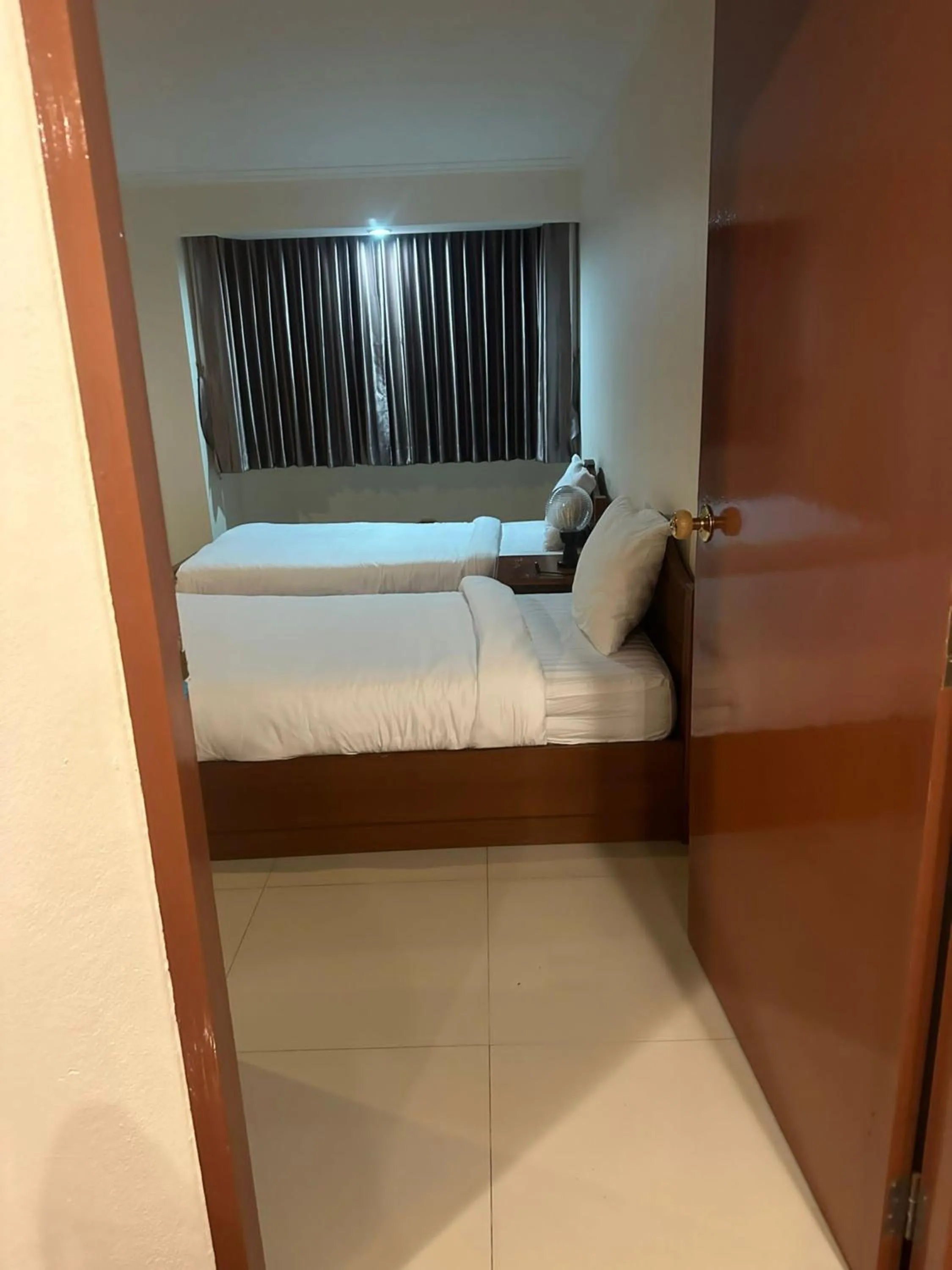 Bedroom, Bed in Omni Tower Direct Rooms - Apartments, Sukhumvit Soi 4
