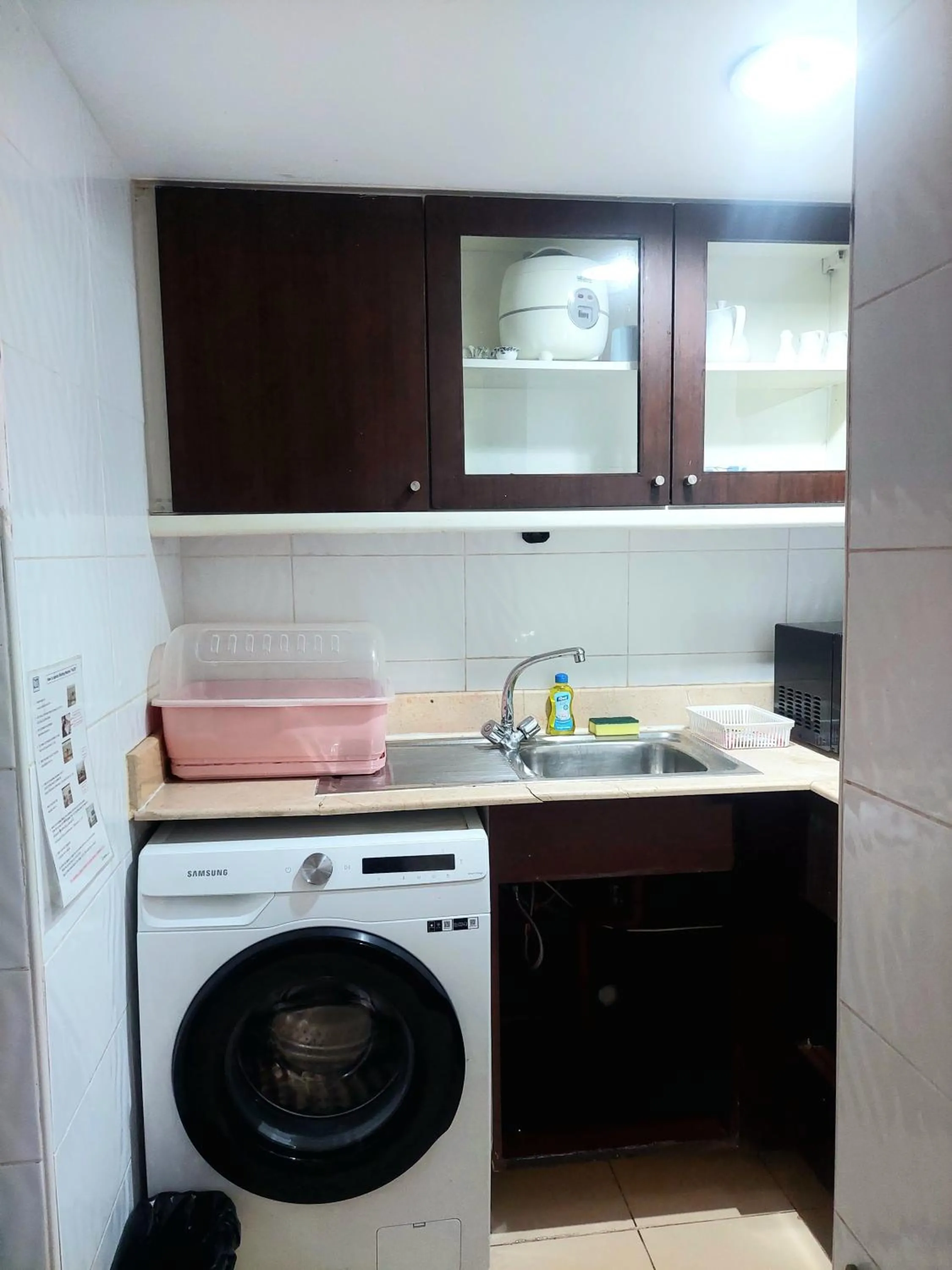 washing machine in Omni Tower Direct Rooms - Apartments, Sukhumvit Soi 4