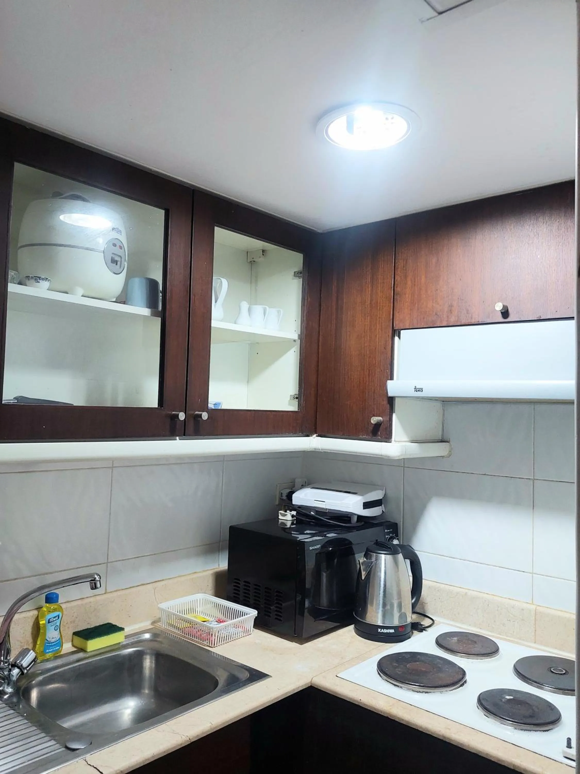 kitchen in Omni Tower Direct Rooms - Apartments, Sukhumvit Soi 4