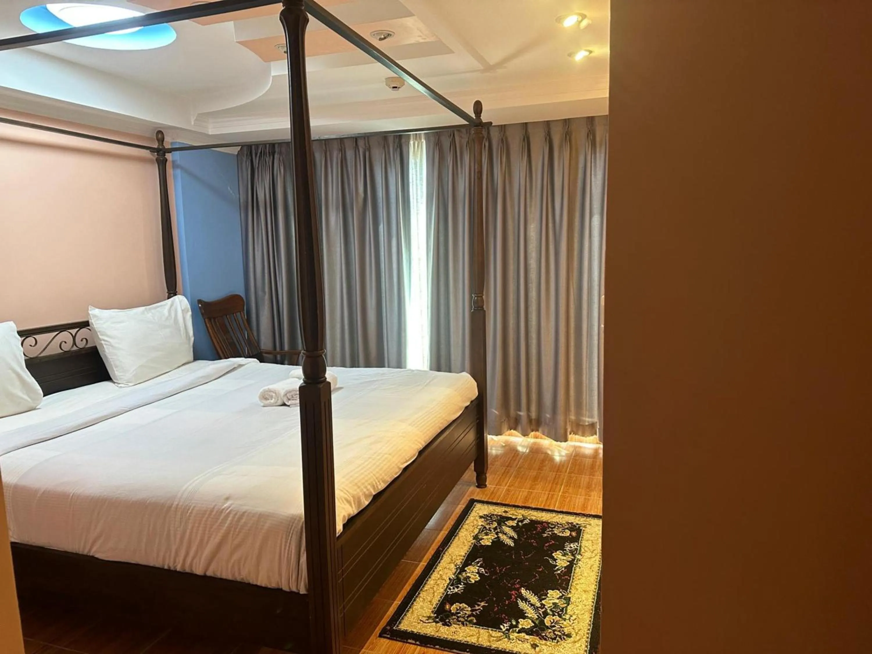 Bedroom, Bed in Omni Tower Direct Rooms - Apartments, Sukhumvit Soi 4