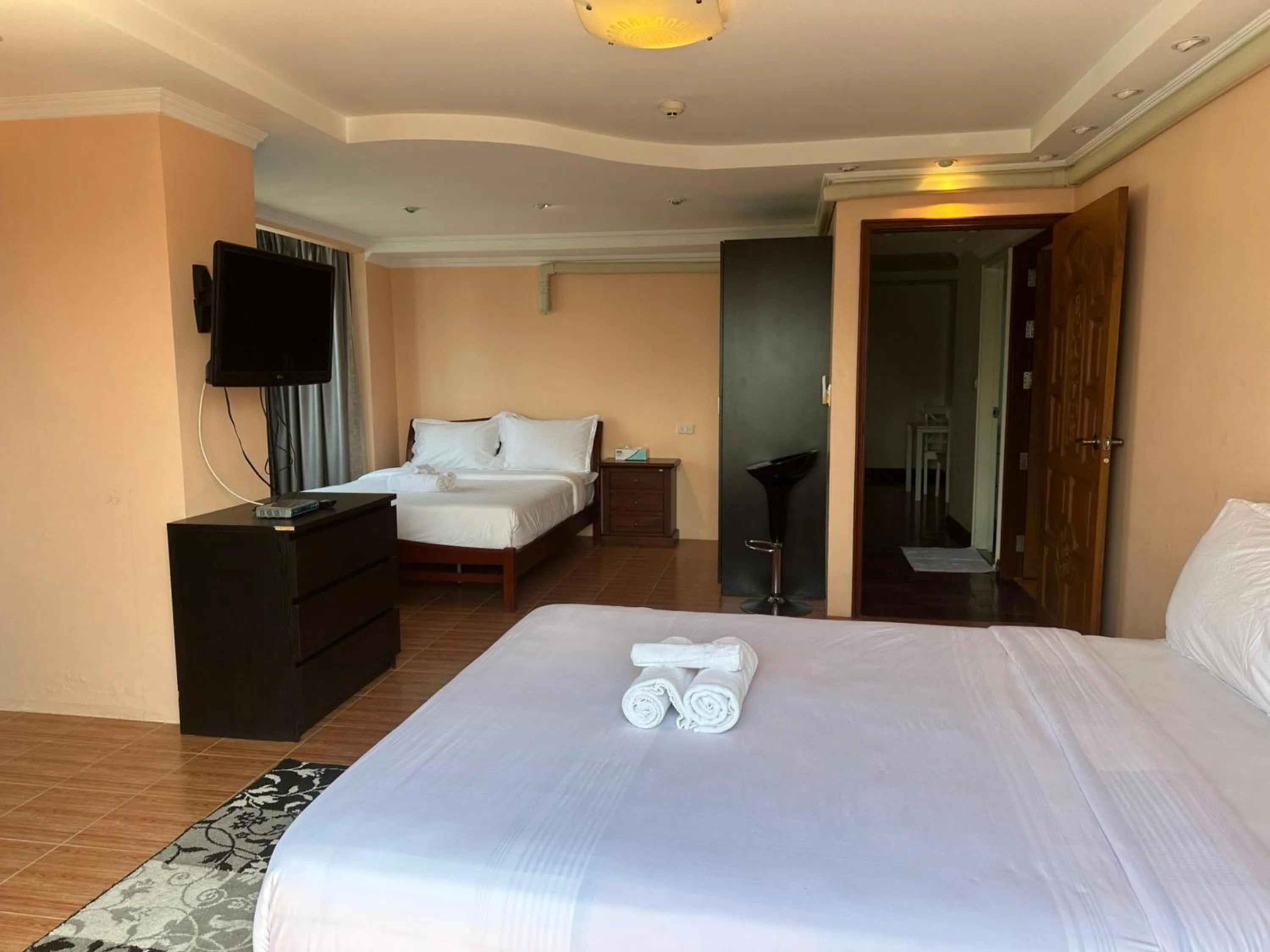 Bedroom, Bed in Omni Tower Direct Rooms - Apartments, Sukhumvit Soi 4