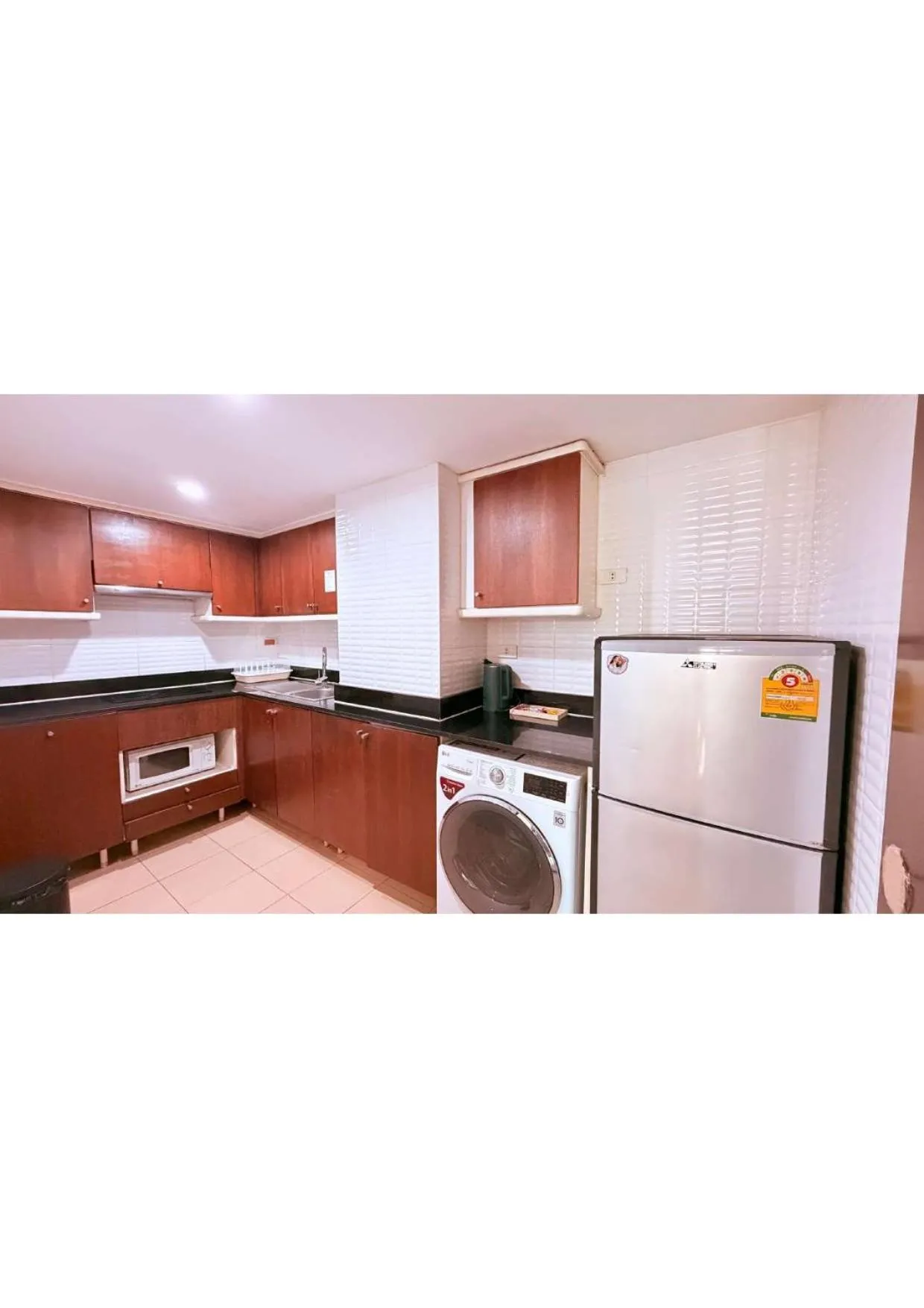 kitchen in Omni Tower Direct Rooms - Apartments, Sukhumvit Soi 4