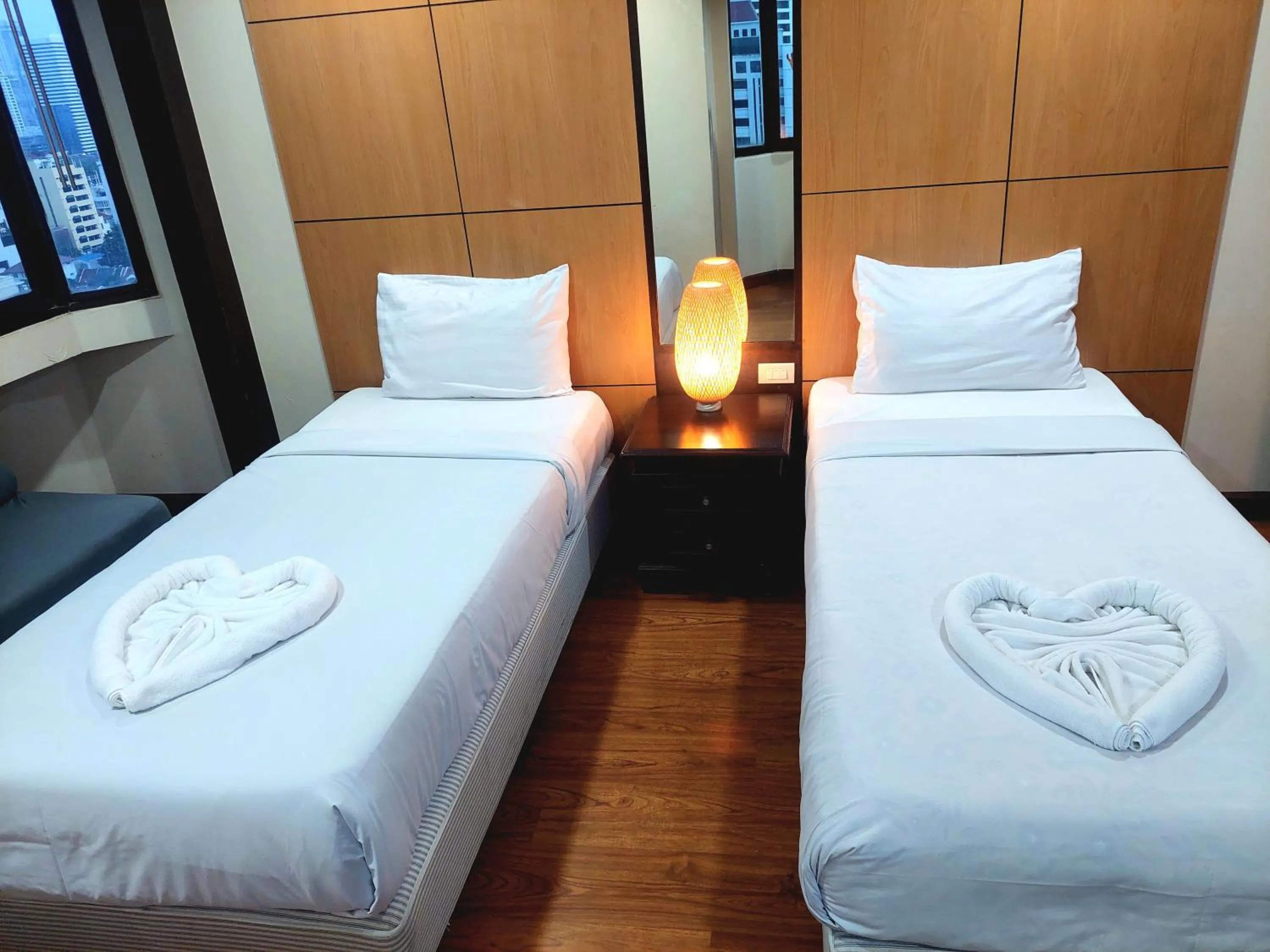 Bedroom, Bed in Omni Tower Direct Rooms - Apartments, Sukhumvit Soi 4