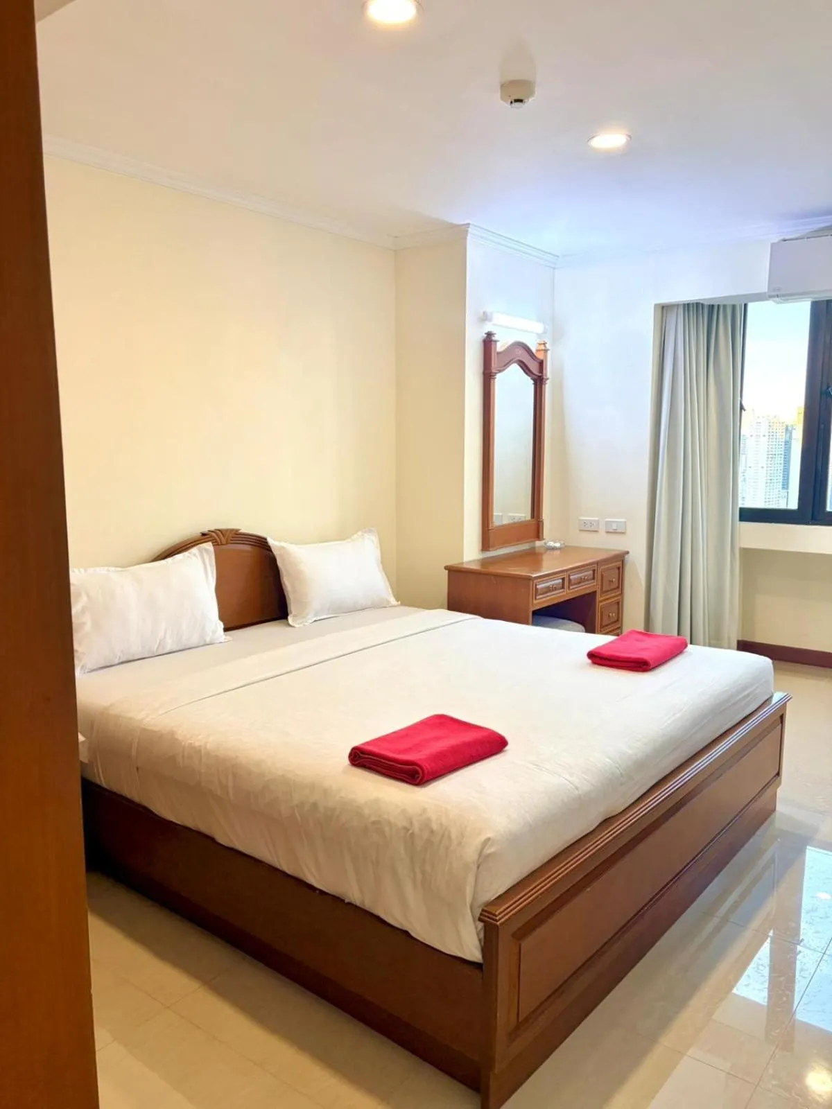 Bedroom, Bed in Omni Tower Direct Rooms - Apartments, Sukhumvit Soi 4