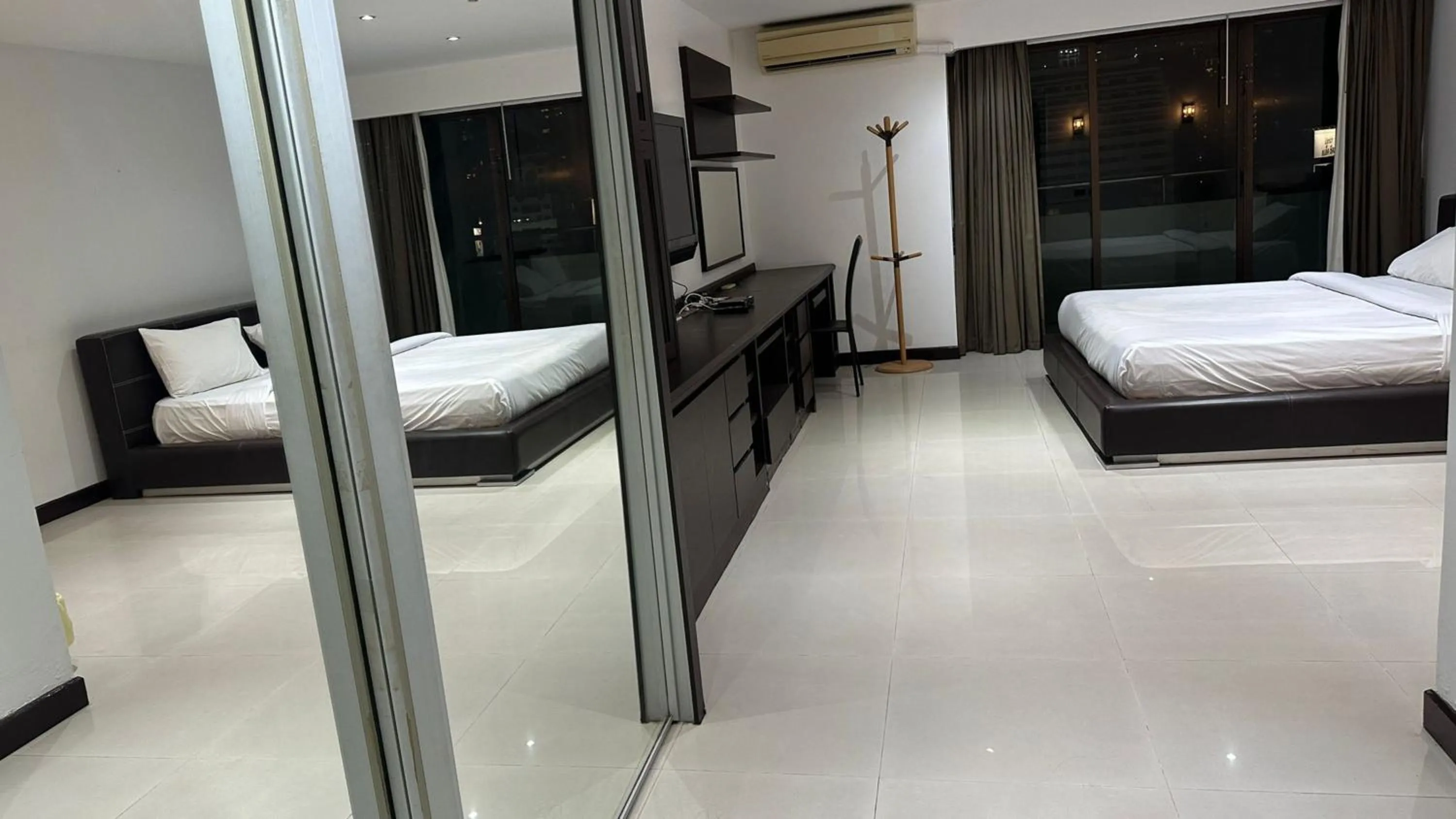 Bedroom, Bed in Omni Tower Direct Rooms - Apartments, Sukhumvit Soi 4